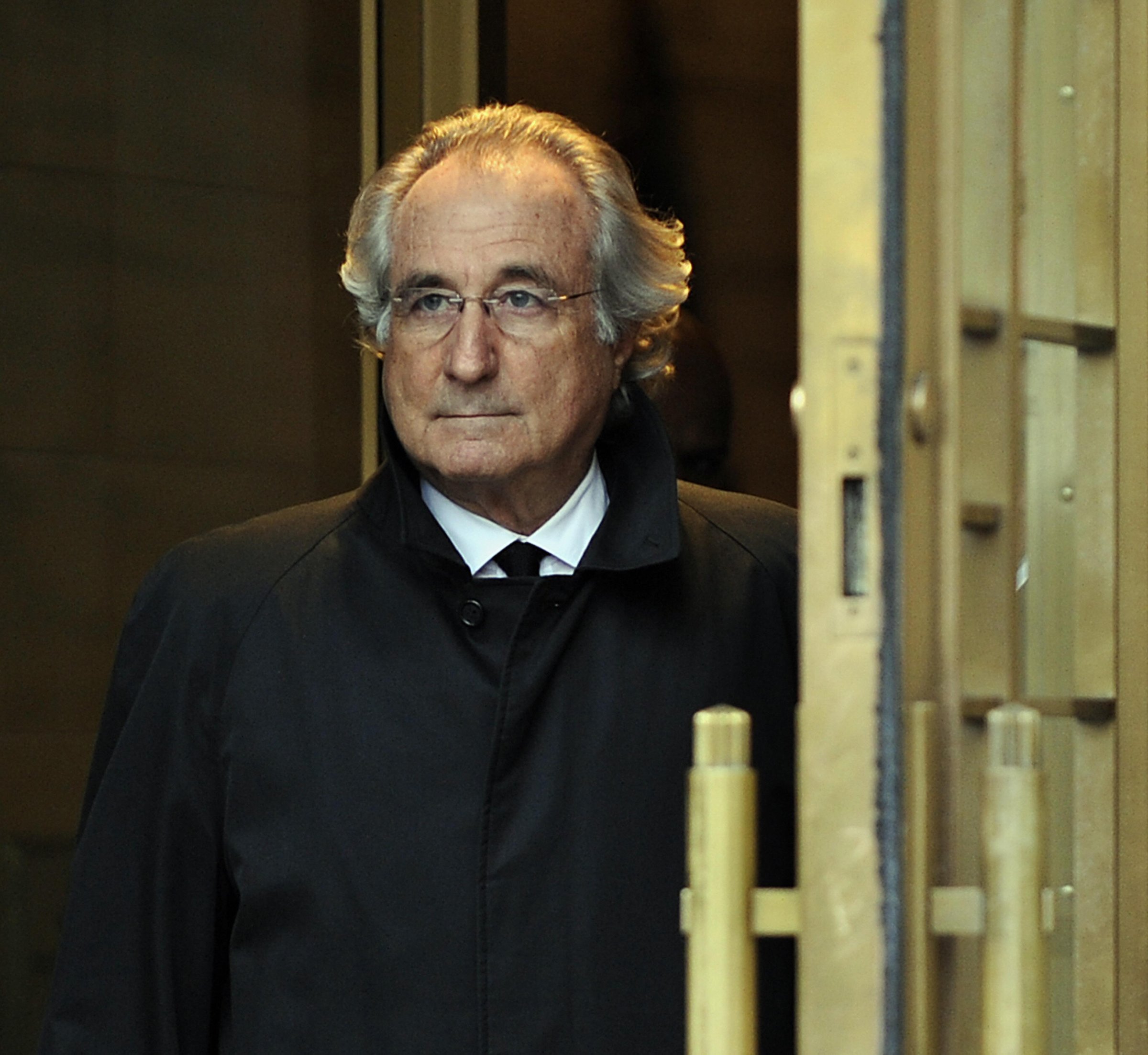 A picture taken on January 14, 2009 in New York, shows Bernard Madoff leaving US Federal Court after a hearing regarding his bail.