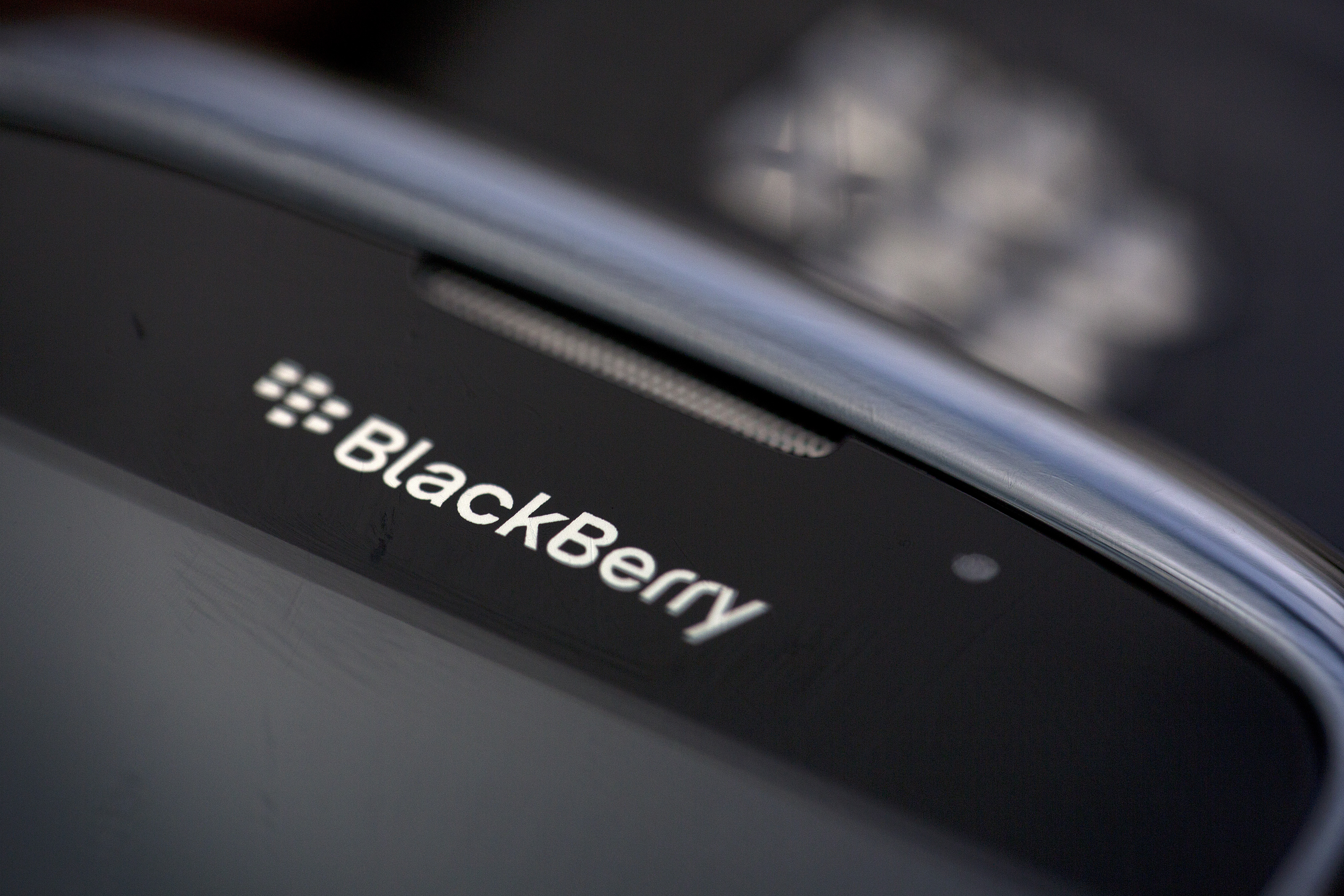 The BlackBerry logo is seen on the screen of a BlackBerry Curve smartphone, produced by BlackBerry Ltd., in this arranged photograph taken in London, U.K., on Monday, Sept. 23, 2013. (Simon Dawson—Bloomberg/Getty Images)