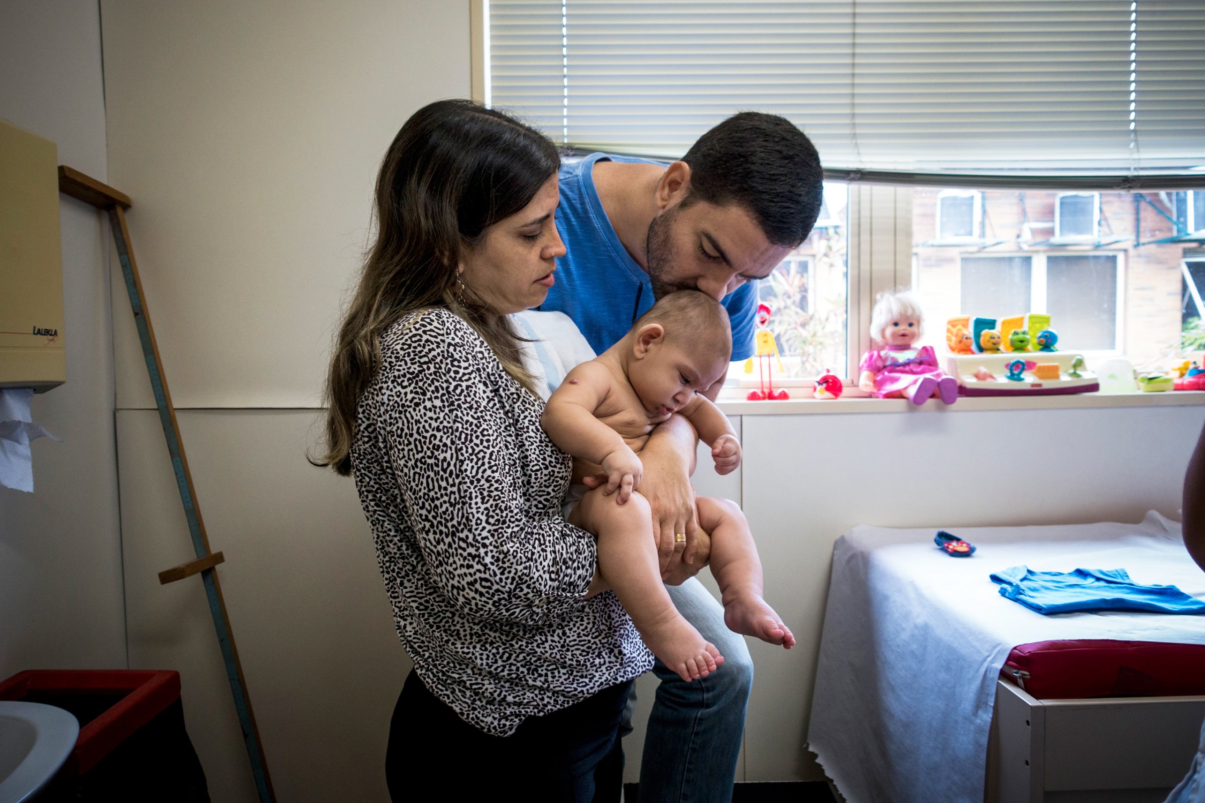 Isabelle and Moises Albuquerque with their son at a rehab center in Recife that helps children with microcephaly