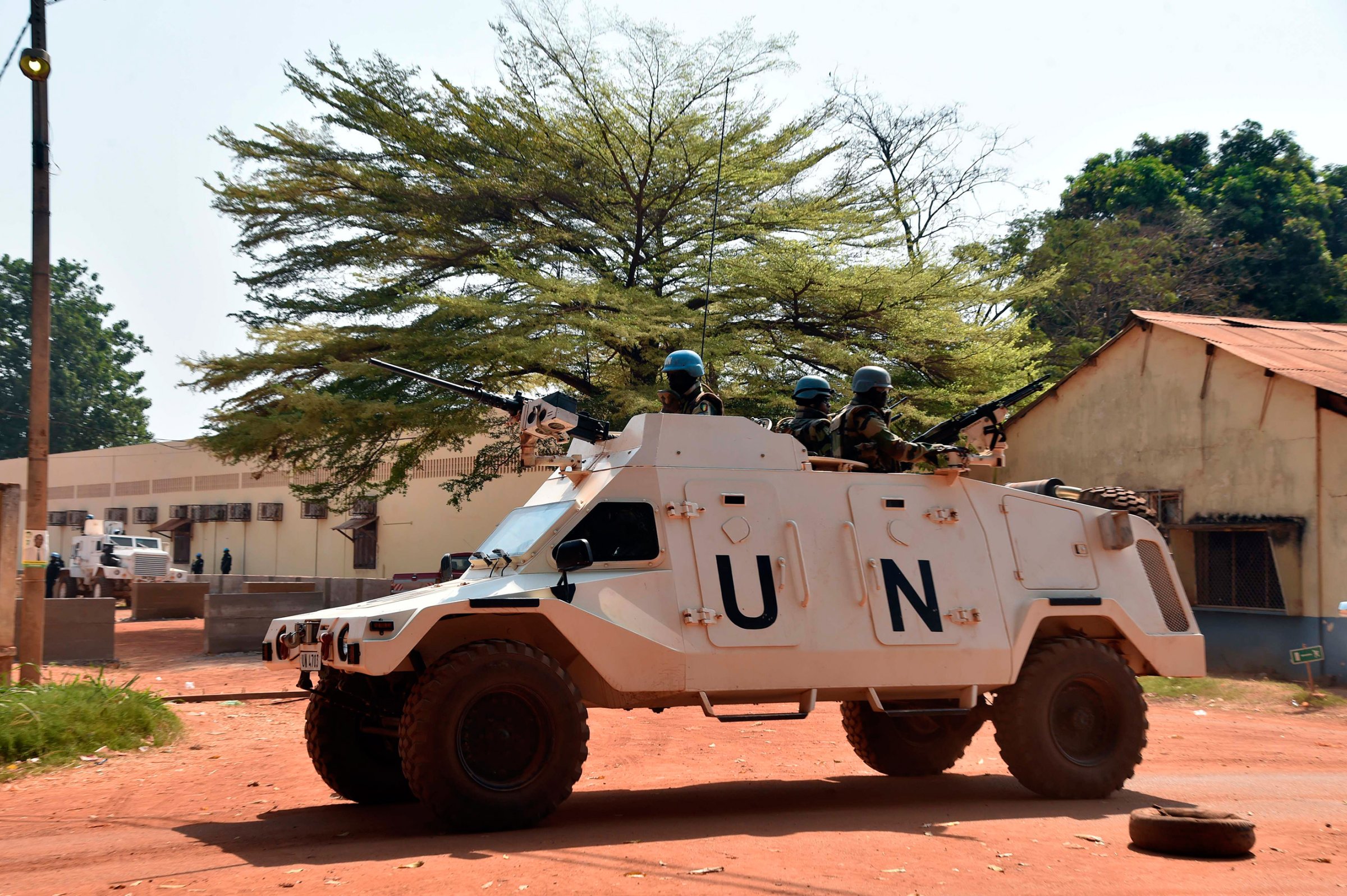 United Nations peacekeepers patrol outside a vote-counting center for the presidential and parliamentary elections in Bangui, Central African Republic, an. 2, 2016.