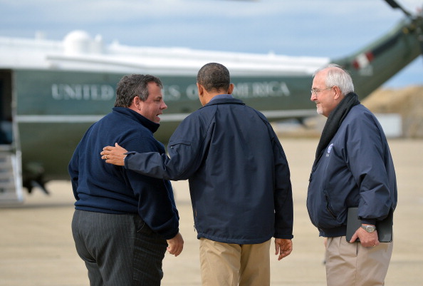 US President Barack Obama, New Jersey governor Chris Christie and FEMA (Federal Emergency Management Agency) Administrator Craig Fugate (R) walk to Marine One for an aerial tour in Atlantic City, New Jersey, on October 31, 2012 to visit areas hardest hit by the unprecedented cyclone Sandy.