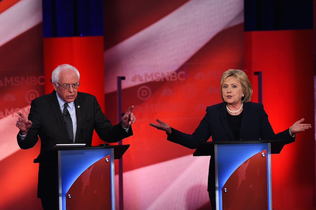US Democratic presidential candidates Hillary Clinton (R) and Bernie Sanders participate in the MSNBC Democratic Candidates Debate at the University of New Hampshire in Durham on Feb. 4, 2016. (Jewel Samad—AFP/Getty Images)