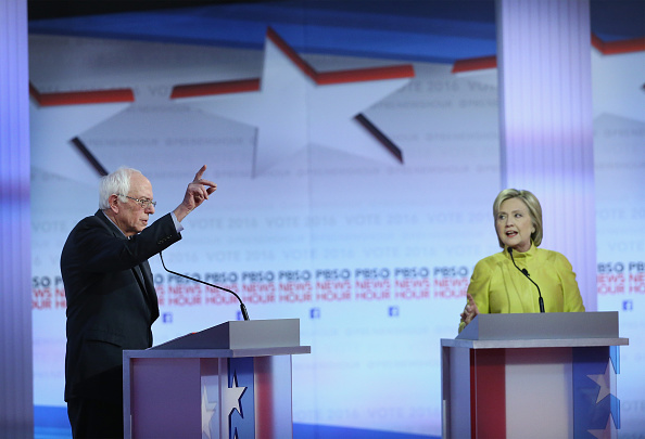 Democratic presidential candidates Senator Bernie Sanders (L) and Hillary Clinton participate in the PBS NewsHour Democratic presidential candidate debate at the University of Wisconsin-Milwaukee in Milwaukee on Feb. 11, 2016. (Win McNamee—Getty Images)