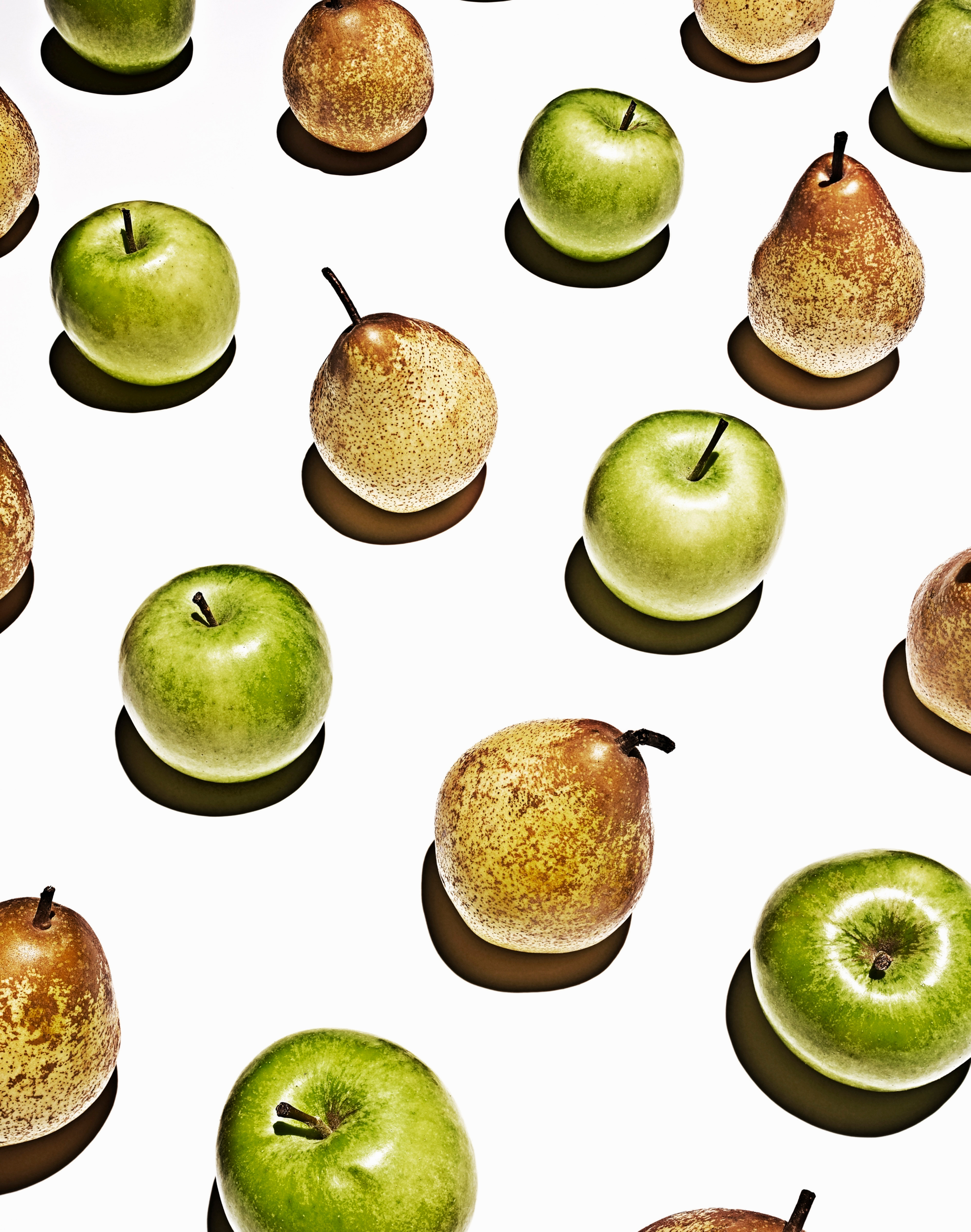 Apples and pears in grid pattern (Getty Images)