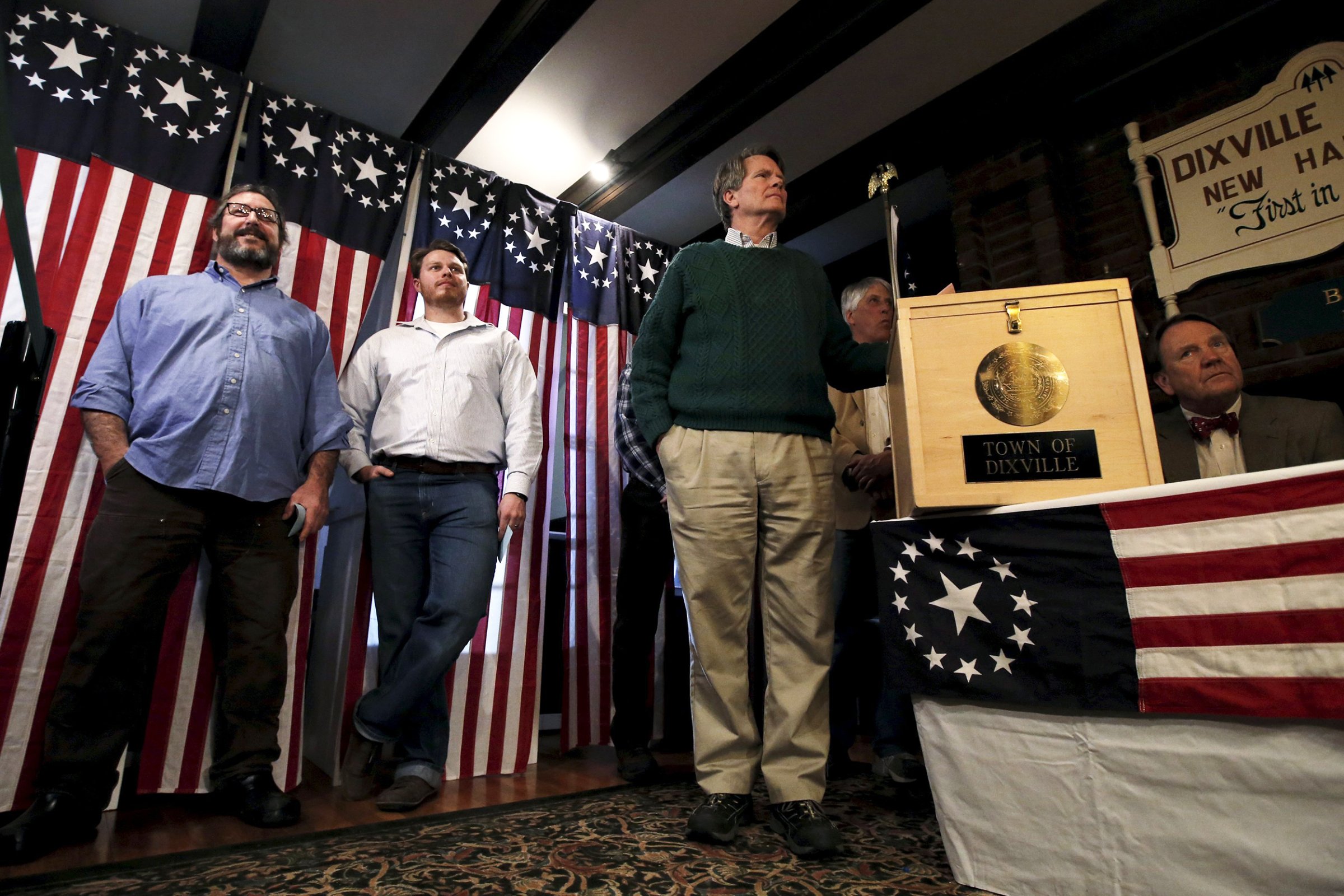 Jeff Stevens and other voters wait for the last few seconds to midnight to cast their votes in the U.S. Presidential primary election at the Hale House at Balsams Hotel in Dixville Notch, NH on Feb. 8, 2016.
