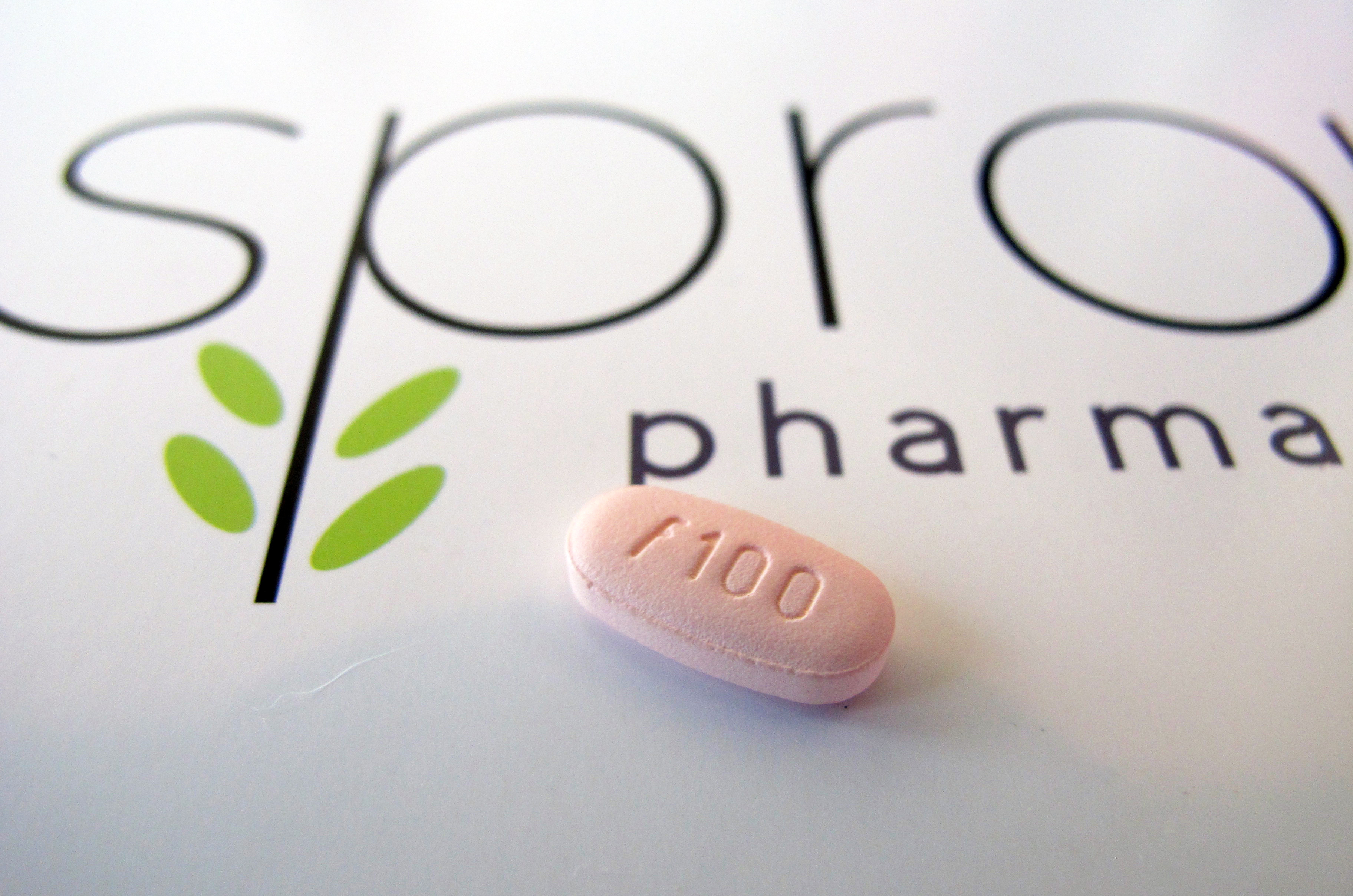A tablet of flibanserin sits on a brochure for Sprout Pharmaceuticals in the company's Raleigh, N.C., headquarters on June 22, 2015. (Allen G. Breed—AP)