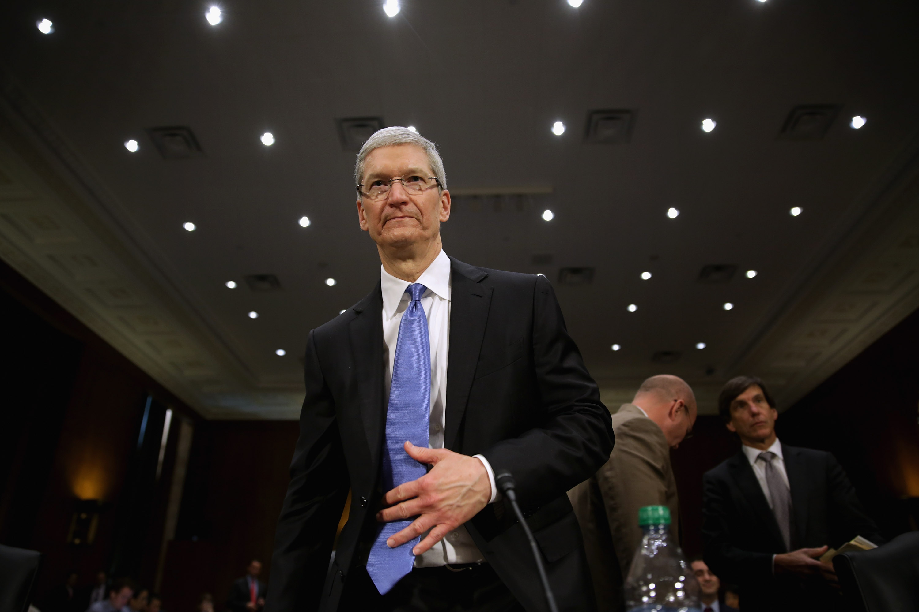 Apple CEO Timothy Cook returns from a break in his testimony before the Senate Homeland Security and Governmental Affairs Committee's Investigations Subcommittee about the company's offshore profit shifting and tax avoidance in the Dirksen Senate Office Building on Capitol Hill May 21, 2013 in Washington, D.C. (Chip Somodevilla&mdash;Getty Images)