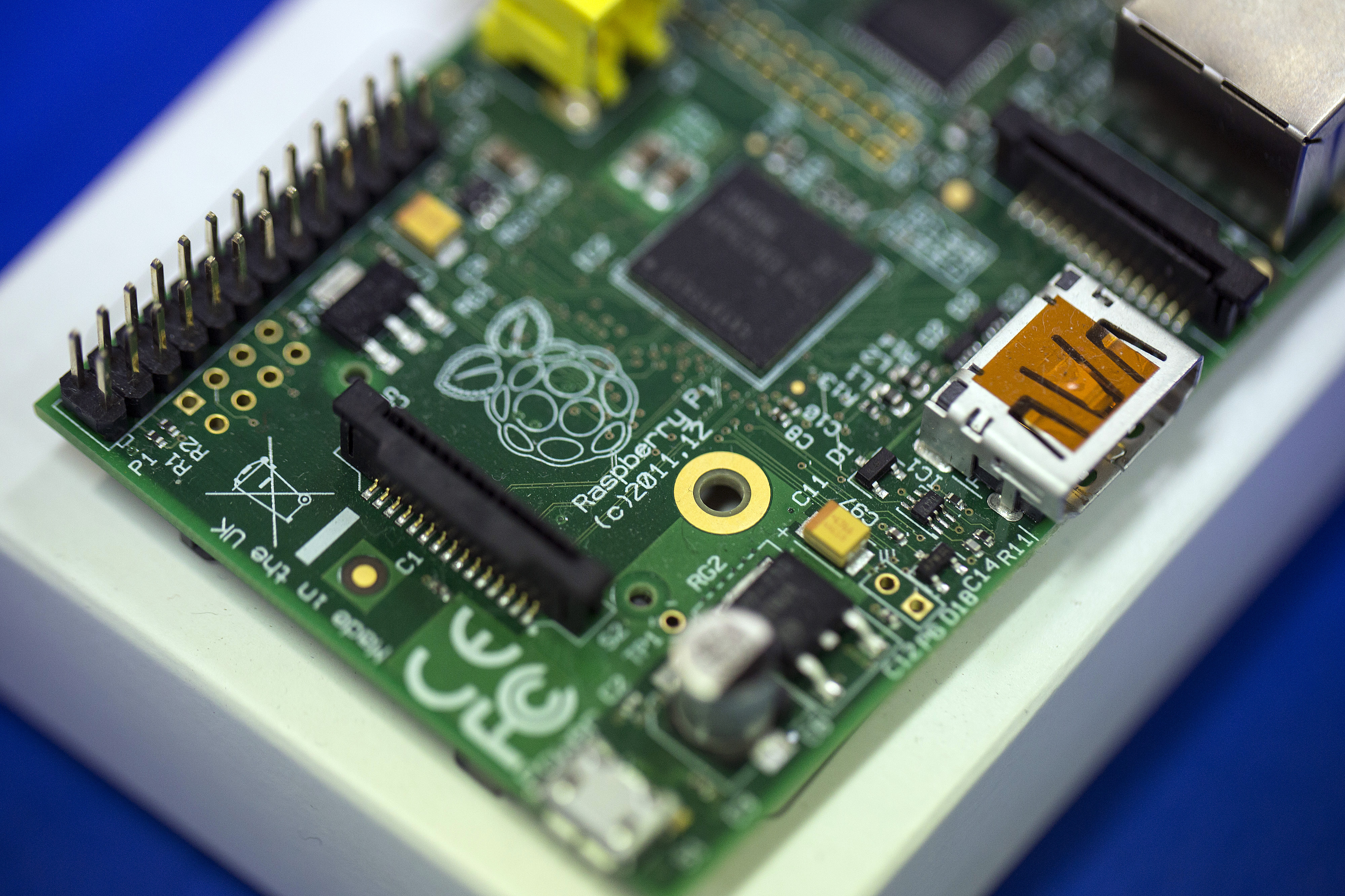 A logo sits on the printed circuit board (PCB) of a Raspberry Pi single-board computer following assembly at Sony Corp.'s technology centre in Pencoed, U.K., on Monday Dec. 16, 2013. (Bloomberg&mdash;Bloomberg via Getty Images)