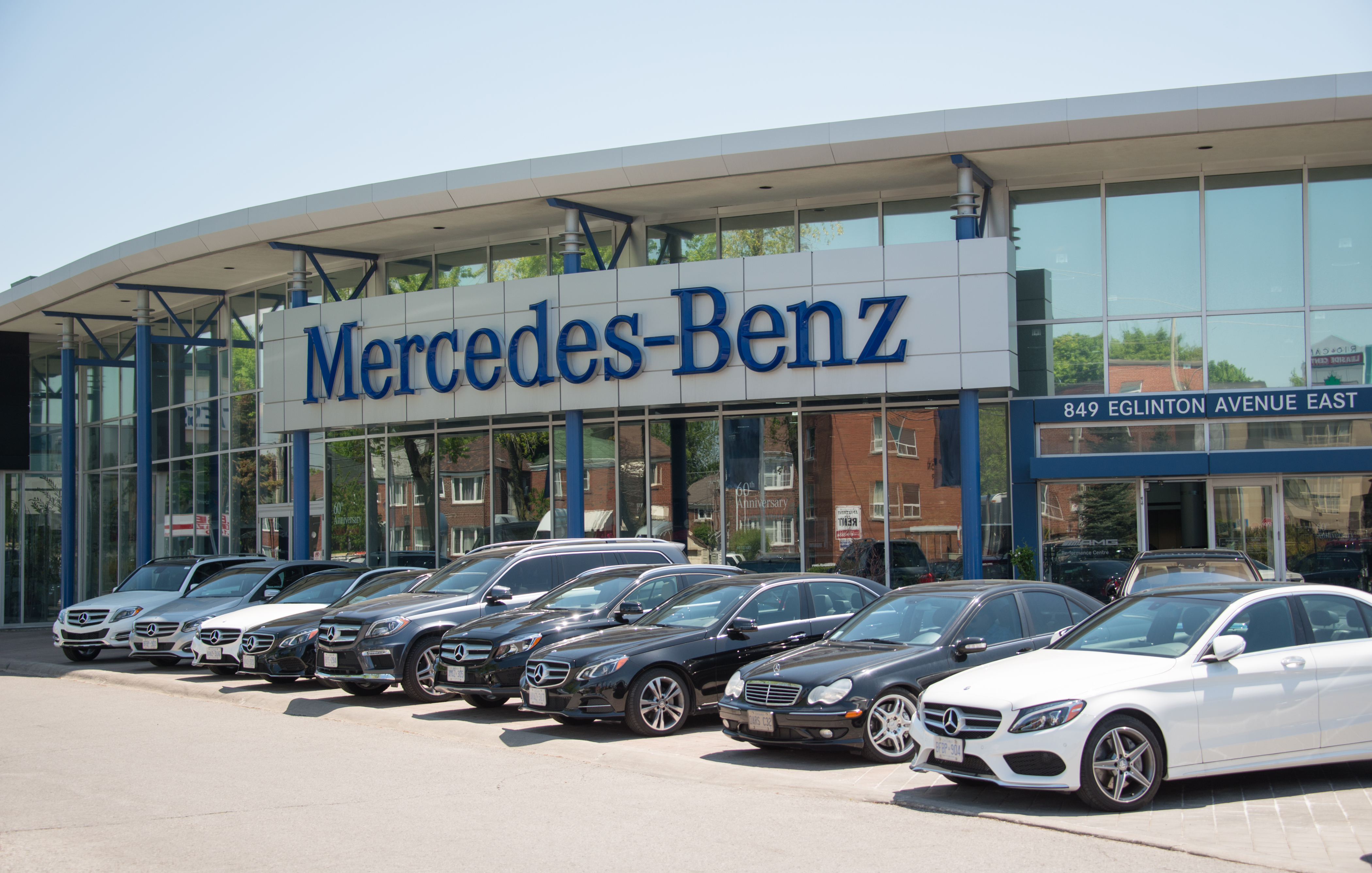 Mercedes Benz dealer in a city, outdoor display of the
