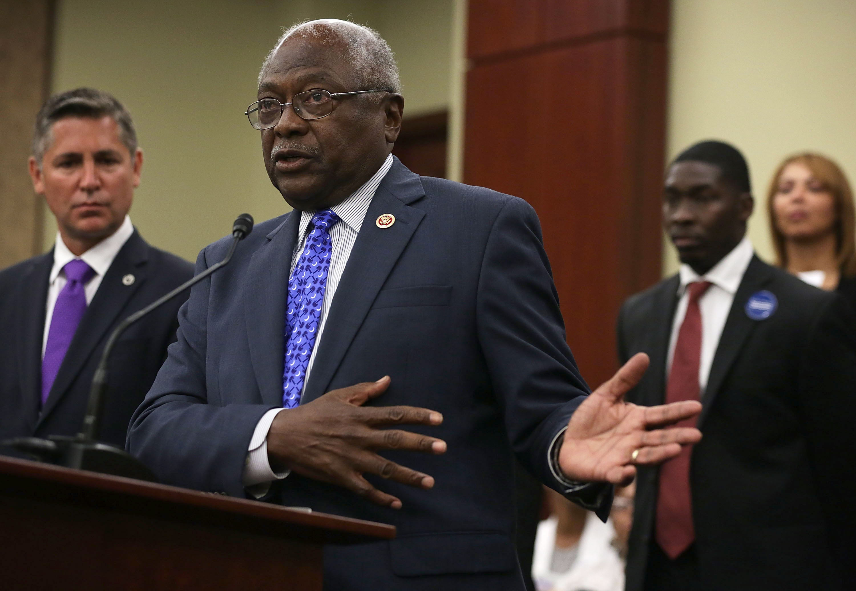 U.S. House Assistant Democratic Leader James Clyburn (D-SC) (2nd L) speaks as President of the Brady Campaign to Prevent Gun Violence Dan Gross, and Andre Duncan (3rd L), nephew of Myra Thompson, one of the victims of the June 17 shooting at the Emanuel AME Church in Charleston, S.C., listen during a news conference July 8, 2015 on Capitol Hill in Washington, DC. 
                       (Alex Wong--Getty Images) (Alex Wong&mdash;Getty Images)