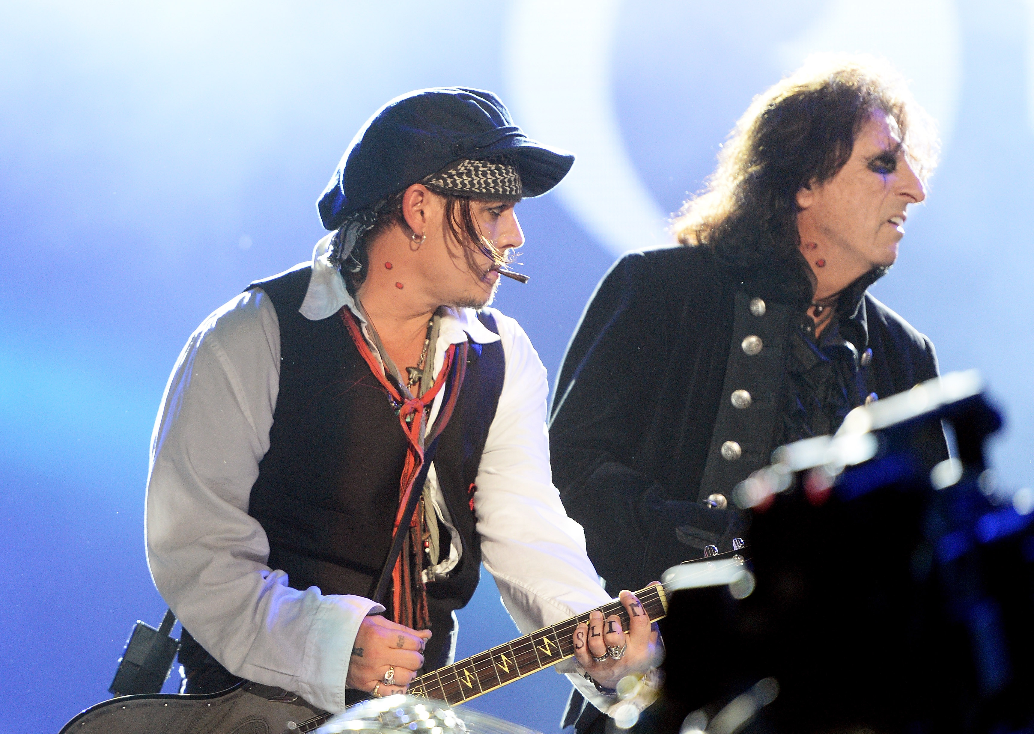 Alice Cooper (R) and Johnny Depp perform with The Hollywood Vampires during Rock in Rio on Sep. 24, 2015, in Rio de Janeiro, Brazil (Dave J Hogan—Getty Images)