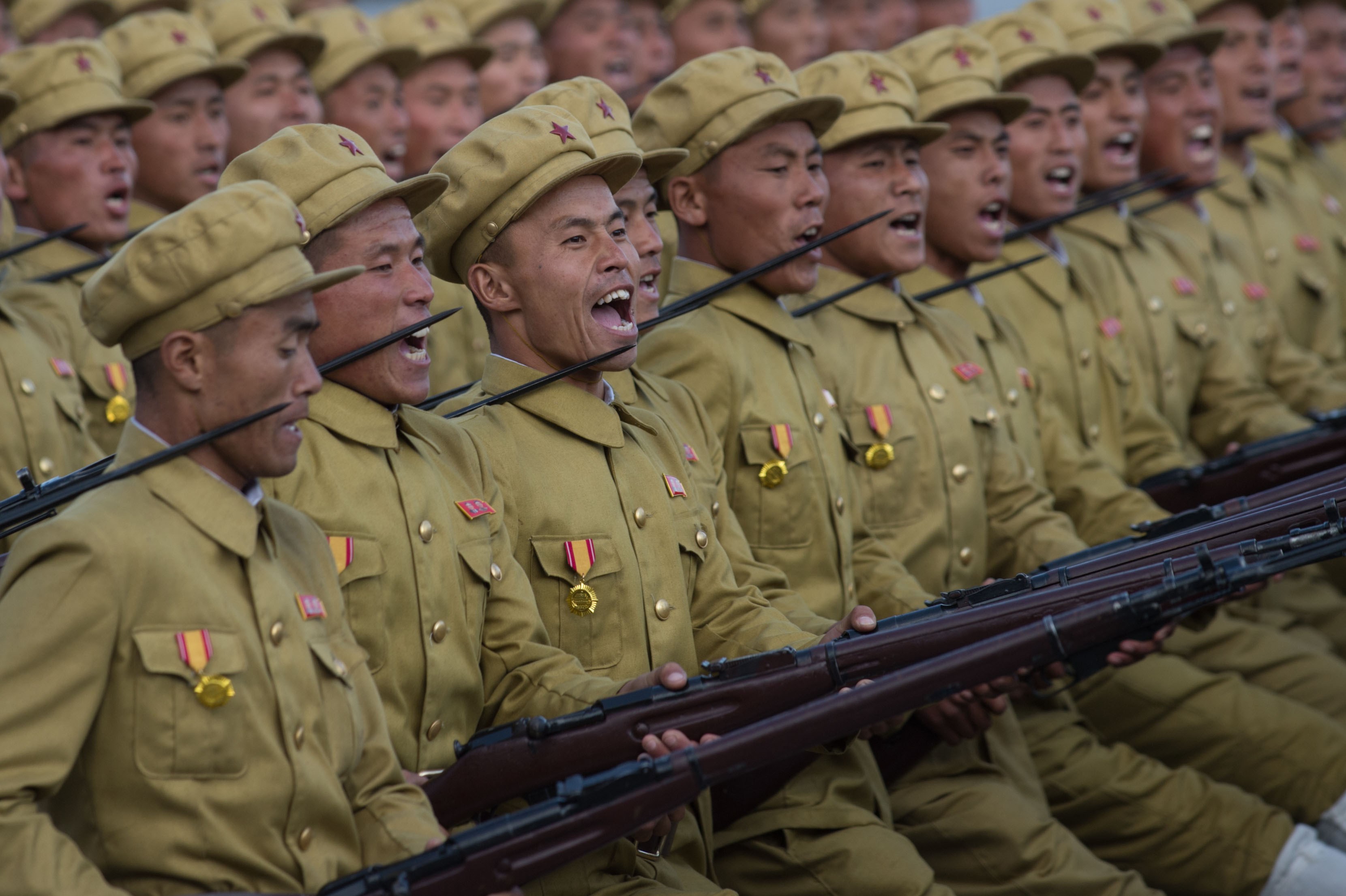 North Korean soldiers march during a mass military parade at Kim Il Sung Square in Pyongyang on Oct. 10, 2015 (Ed Jones—AFP/Getty Images)