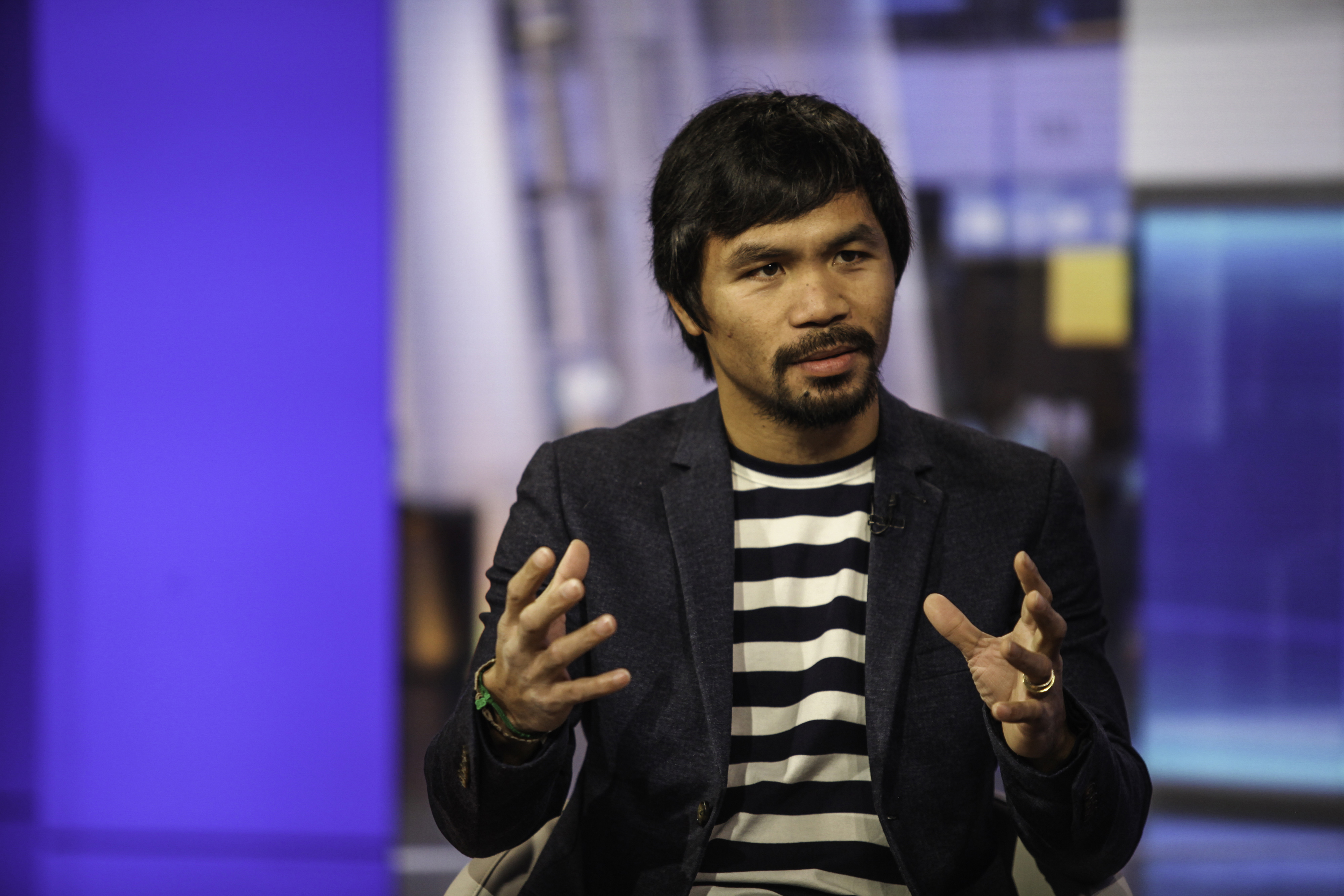 Professional boxer Manny Pacquiao speaks during a Bloomberg Television interview in New York, U.S., on Tuesday, Oct. 13, 2015. (Chris Goodney—Bloomberg)