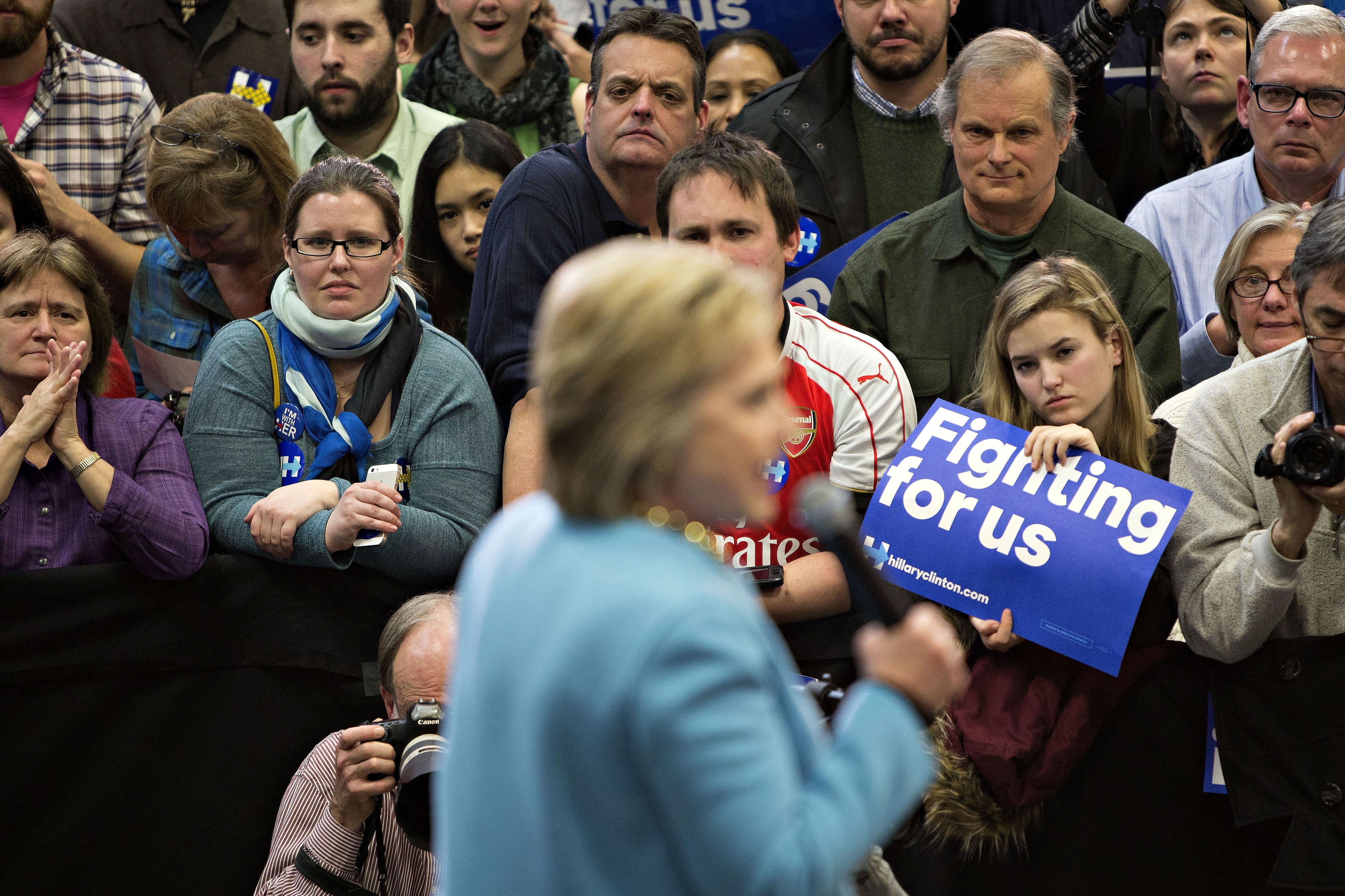 Attendees listen as Hillary Clinton, former Secretary of State and 2016 Democratic presidential candidate, speaks during a campaign event in Manchester, N.H., on Feb. 8, 2016 (Bloomberg/Getty Images)