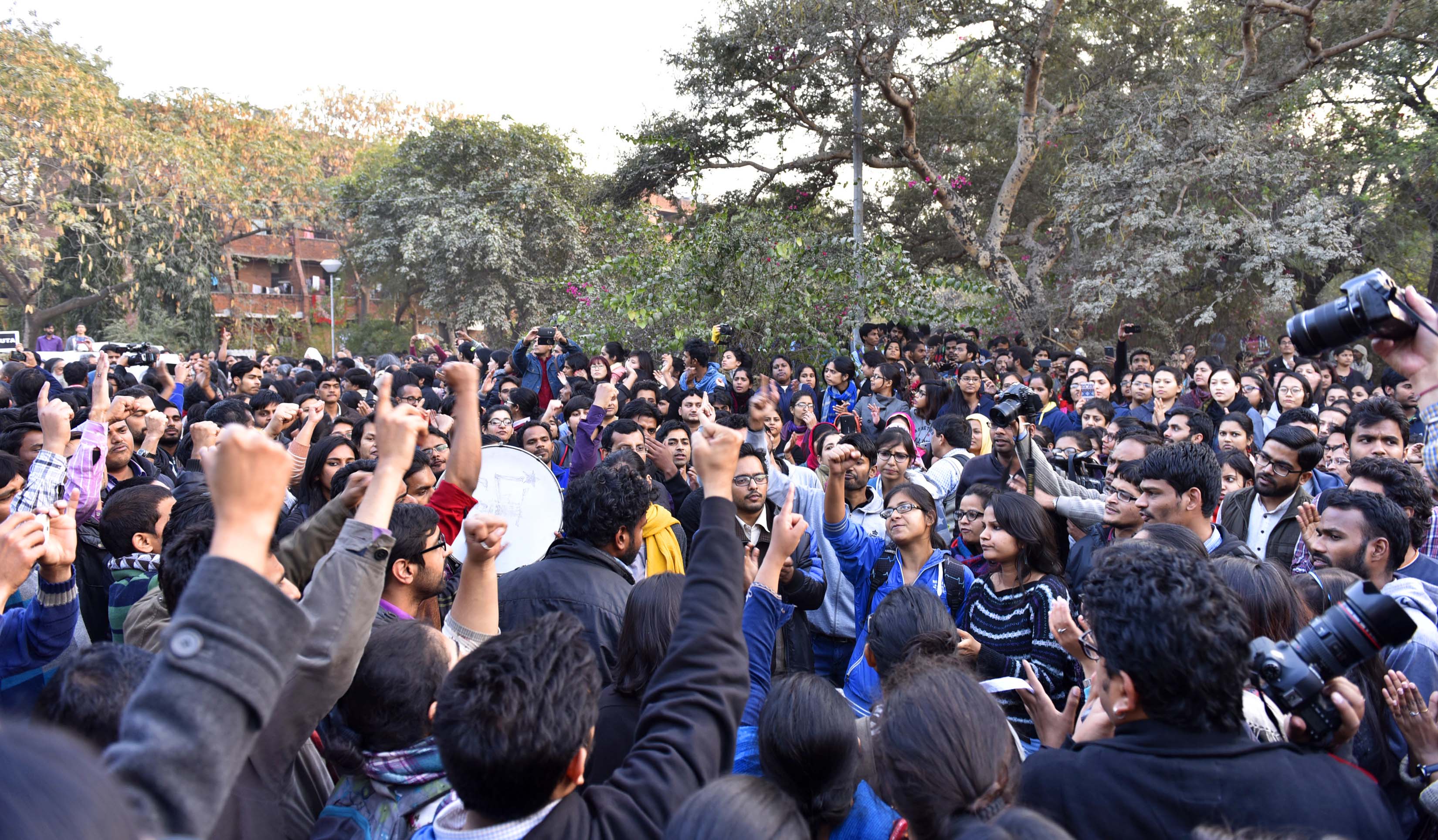 Jawaharlal Nehru University teachers and students form a human chain inside the campus in New Delhi on Feb. 14, 2016, in protest against the arrest of JNU students'-union president Kanhaiya Kumar, who was arrested on sedition charges in connection with an event organized on the campus against the hanging of Afzal Guru (Sanjeev Verma—Hindustan Times/Getty Images)