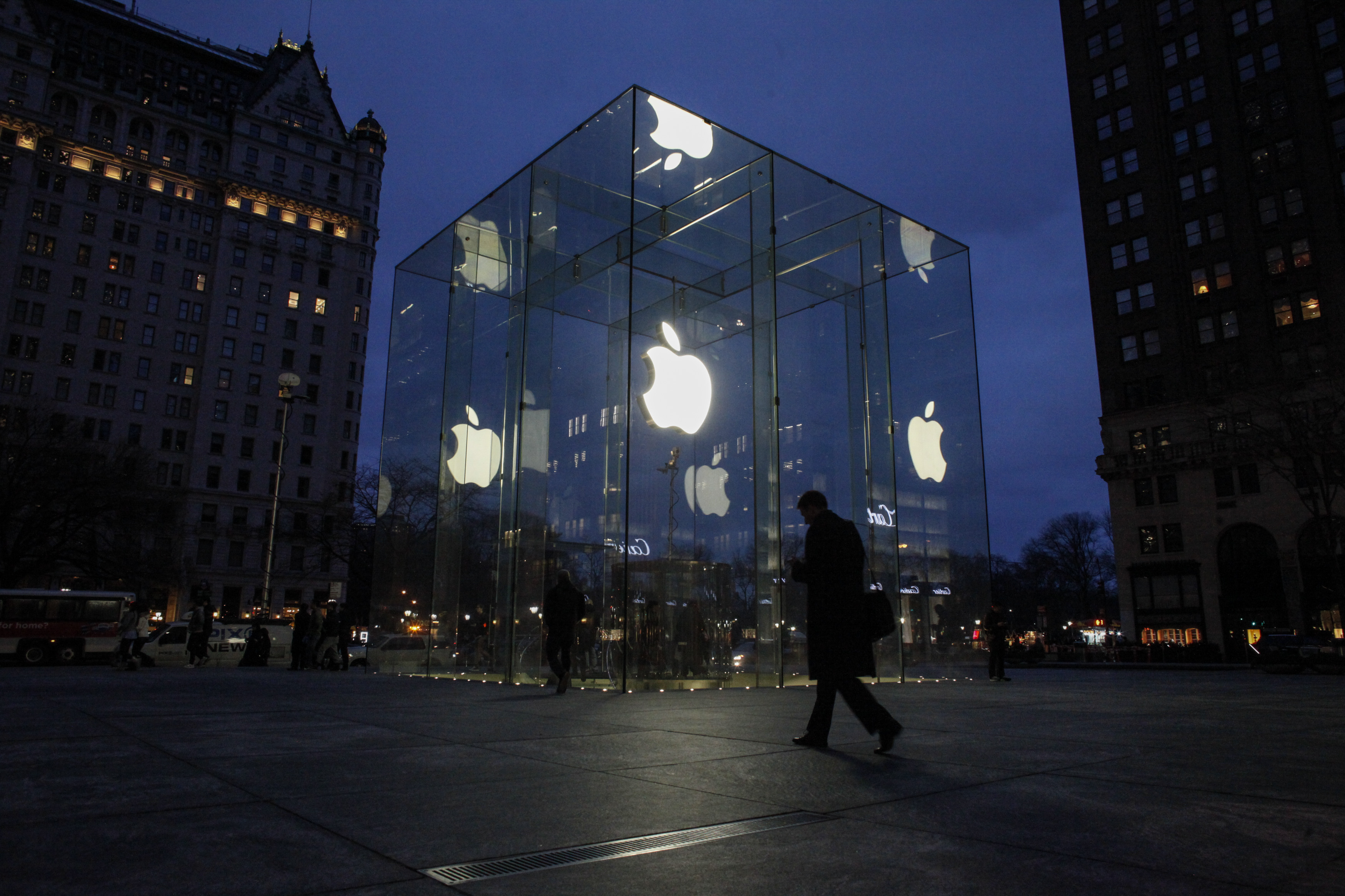 A man walks outside the Apple store on the Fifth Avenue in New York City on Feb. 17, 2016 (Kena Betancur—AFP/Getty Images)