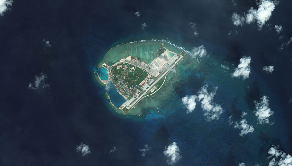 This week’s deployment of aircraft on Woody Island extends the reach of Chinese warplanes about 250 miles into the South China Sea. (DigitalGlobe via Getty Images)