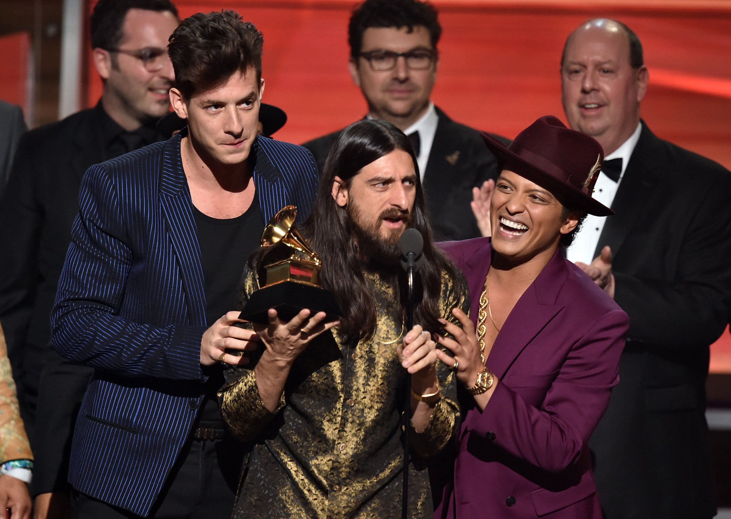 From left: Mark Ronson, Jeff Bhasker, and Bruno Mars accept "Record Of The Year" during the 58th GRAMMY Awards at Staples Center on Feb. 15, 2016 in Los Angeles.