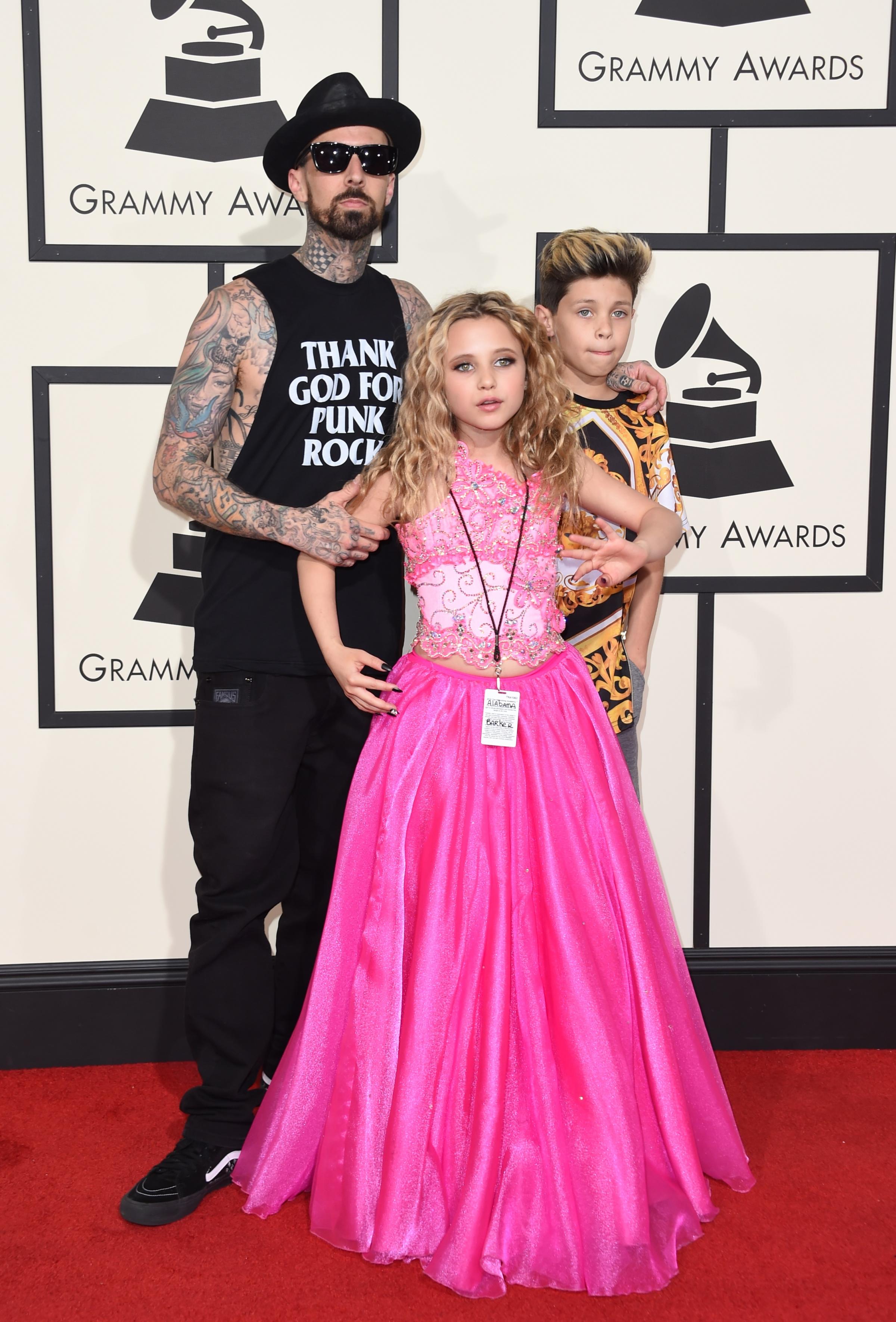 Travis Barker and his children attend the 58th GRAMMY Awards at Staples Center on Feb. 15, 2016 in Los Angeles.