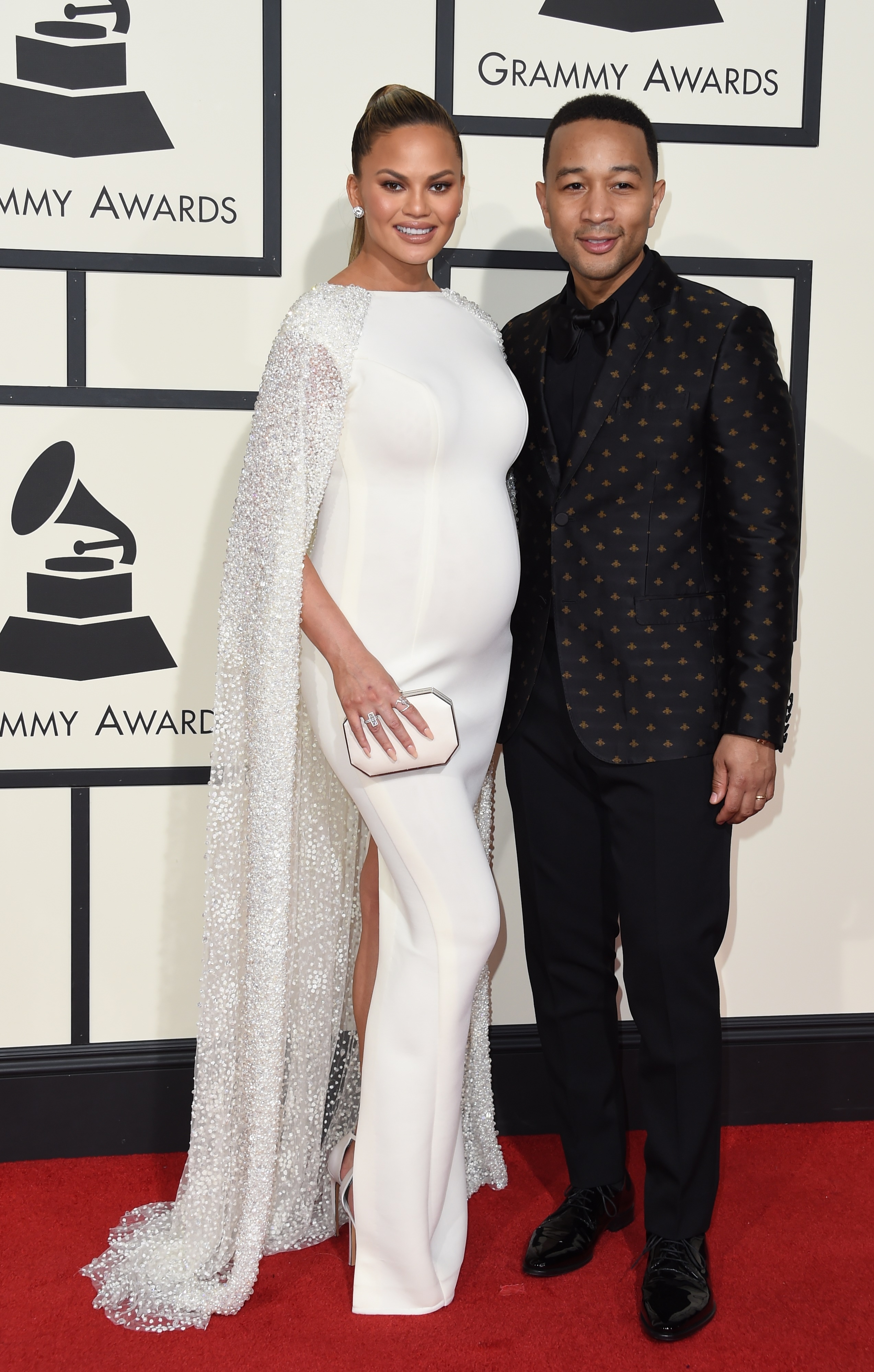 Chrissy Teigen, left, and John Legend, right, attend the 58th GRAMMY Awards at Staples Center on Feb. 15, 2016 in Los Angeles.