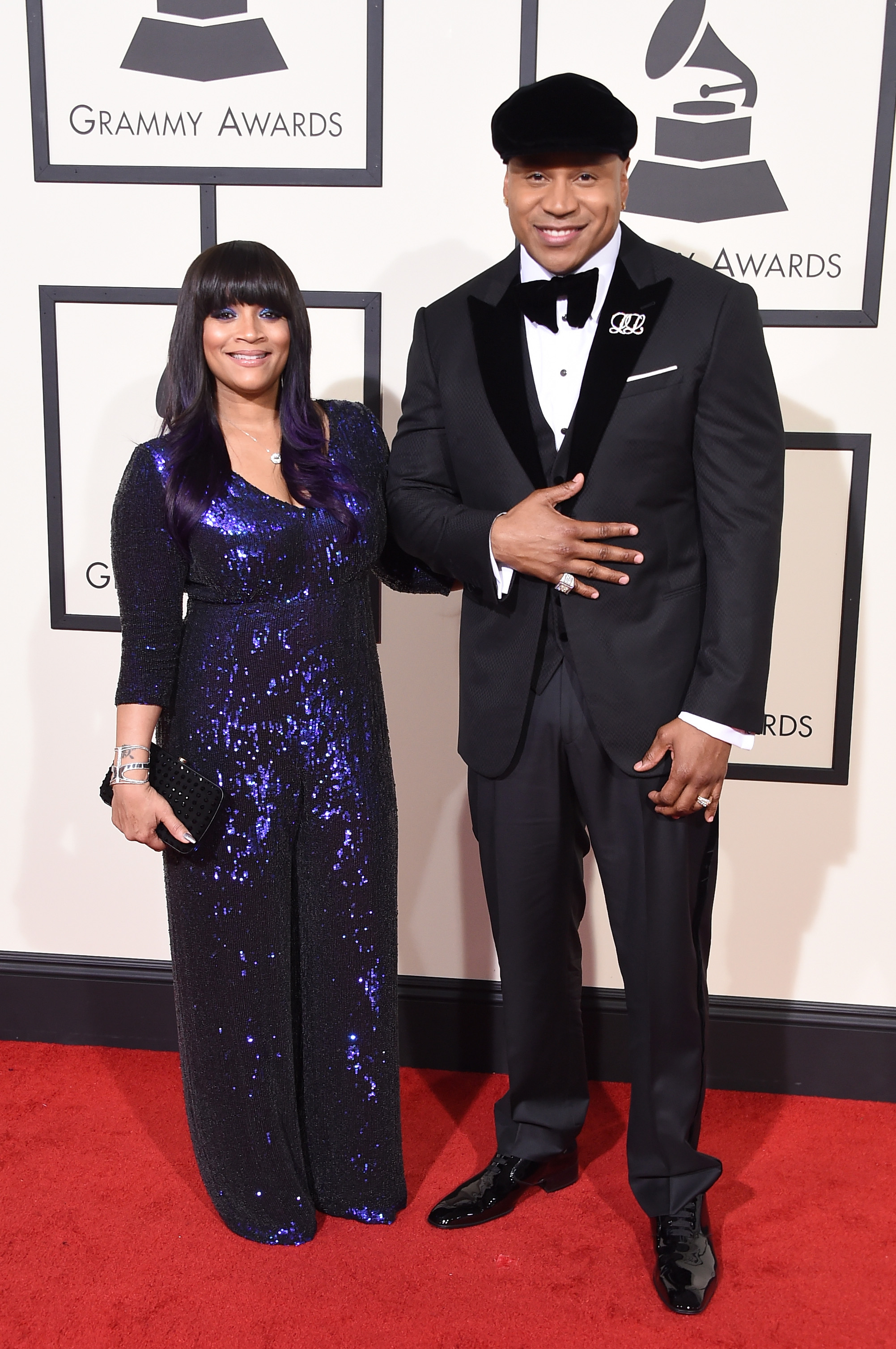 Simone Smith, left, and host LL Cool J, right, attend the 58th GRAMMY Awards at Staples Center on Feb. 15, 2016 in Los Angeles.