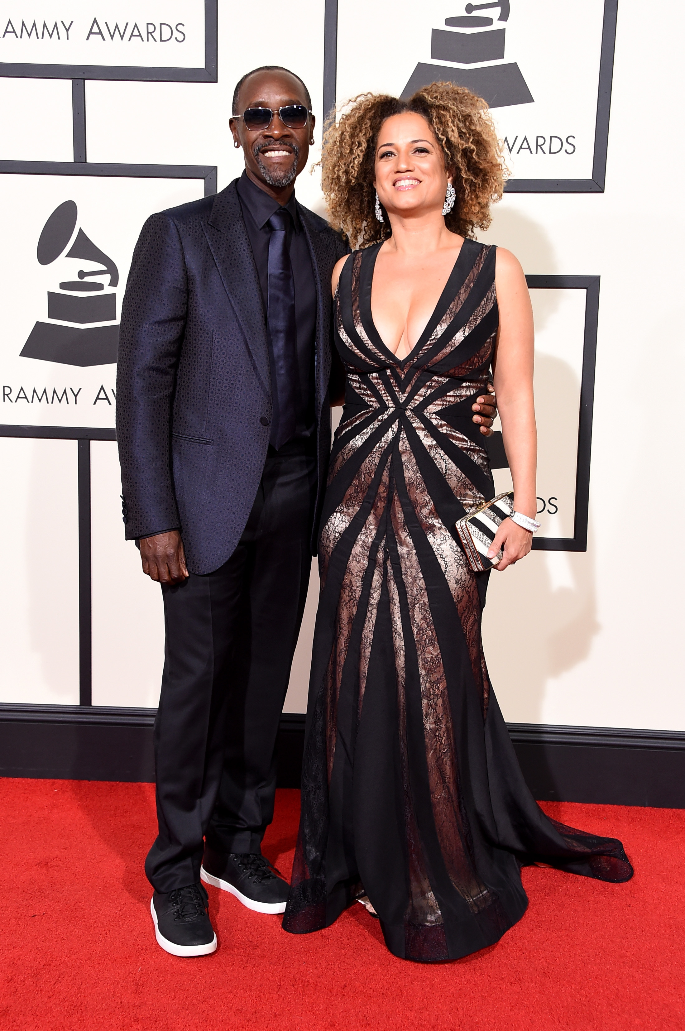 Don Cheadle, left, and Bridgid Coulter, right, attend the 58th GRAMMY Awards at Staples Center on Feb. 15, 2016 in Los Angeles.