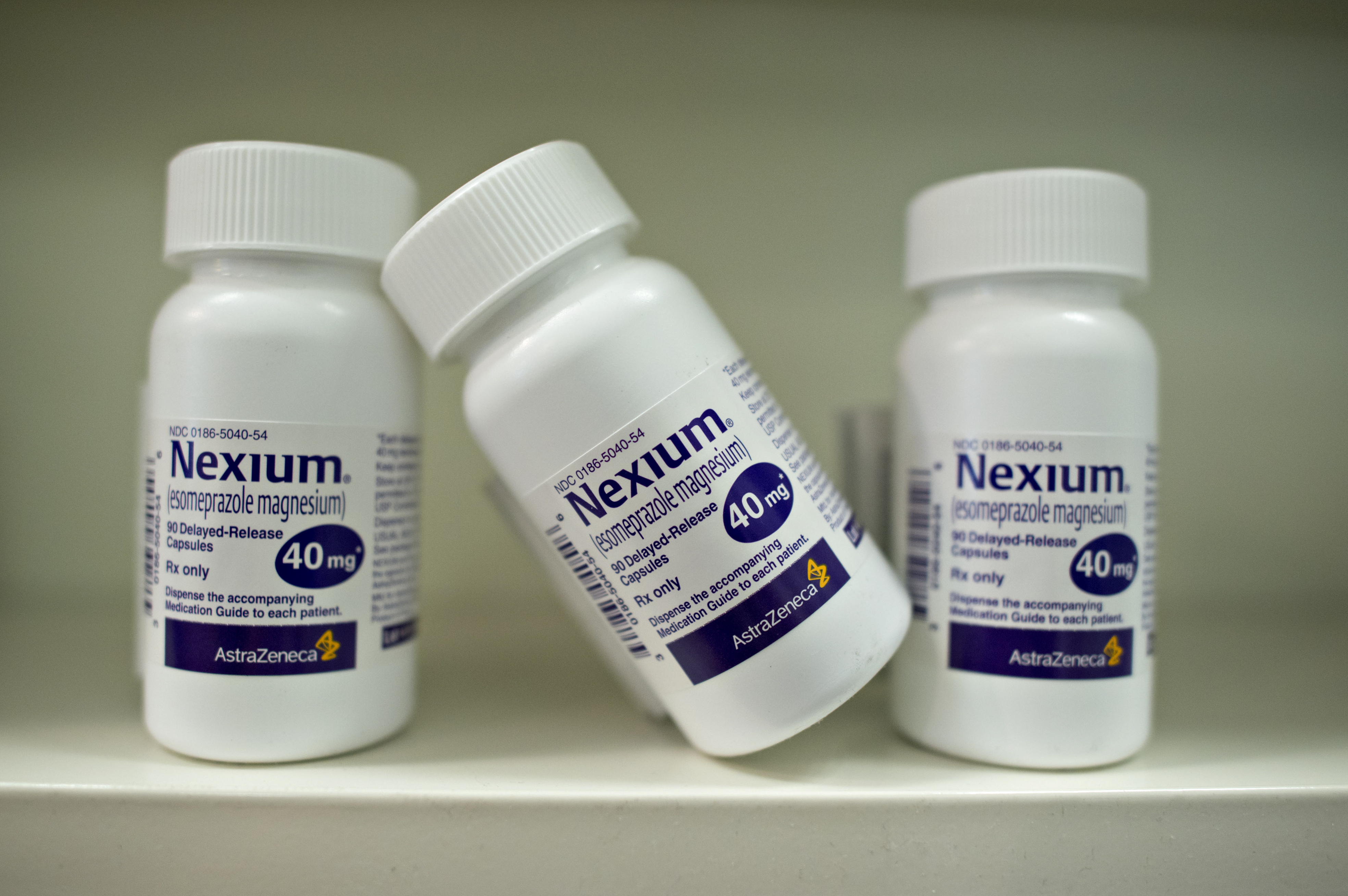 Bottles of AstraZeneca Plc's Nexium heartburn medication are arranged for a photograph at a pharmacy in Princeton, Illinois, U.S., on Wednesday, Aug. 20, 2014. (Daniel Acker—Bloomberg/Getty Images)