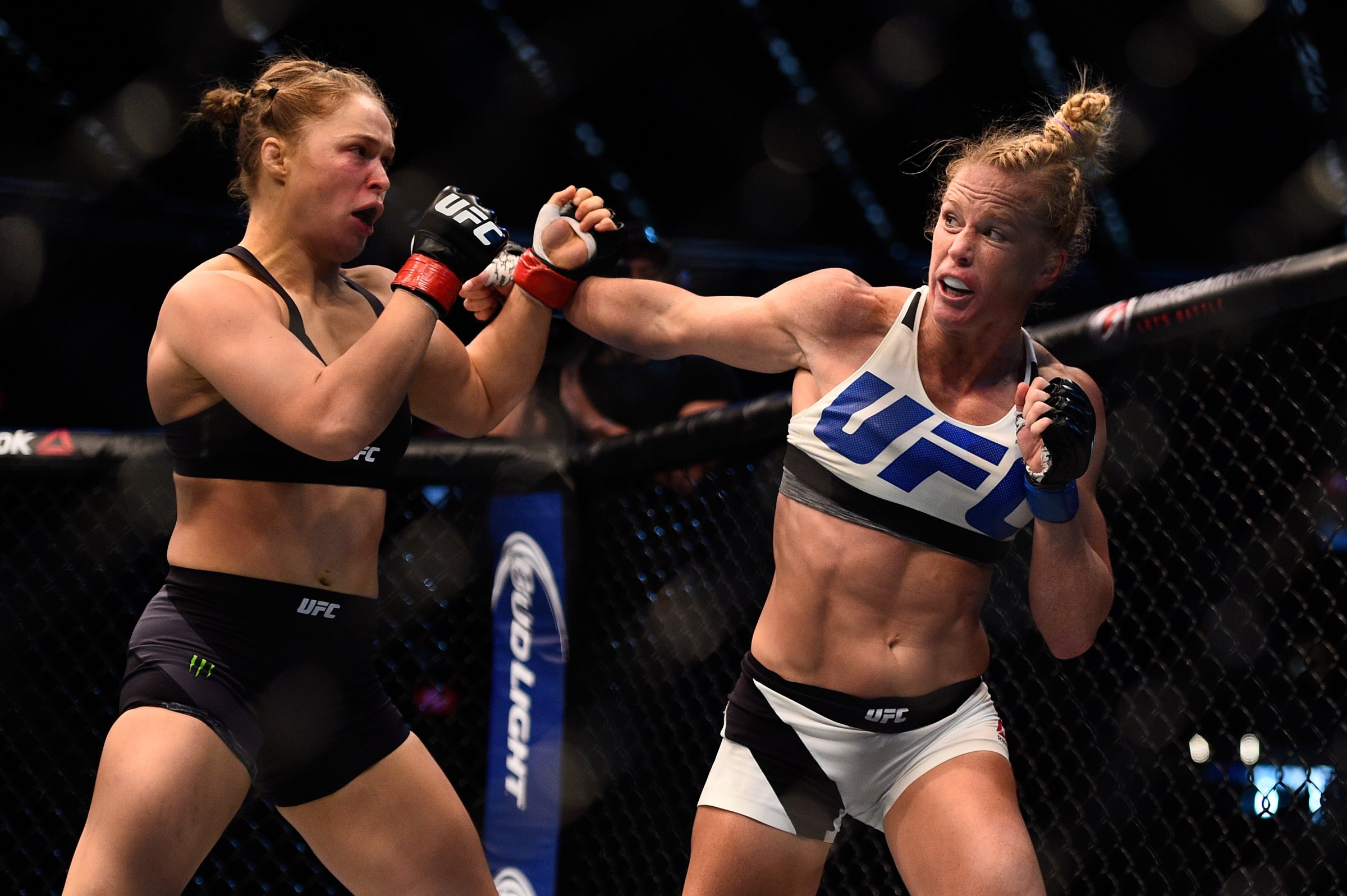 Ronda Rousey blocks a punch from Holly Holm in their UFC women's bantamweight championship bout during the UFC 193 event at Etihad Stadium on November 15, 2015 in Melbourne, Australia.