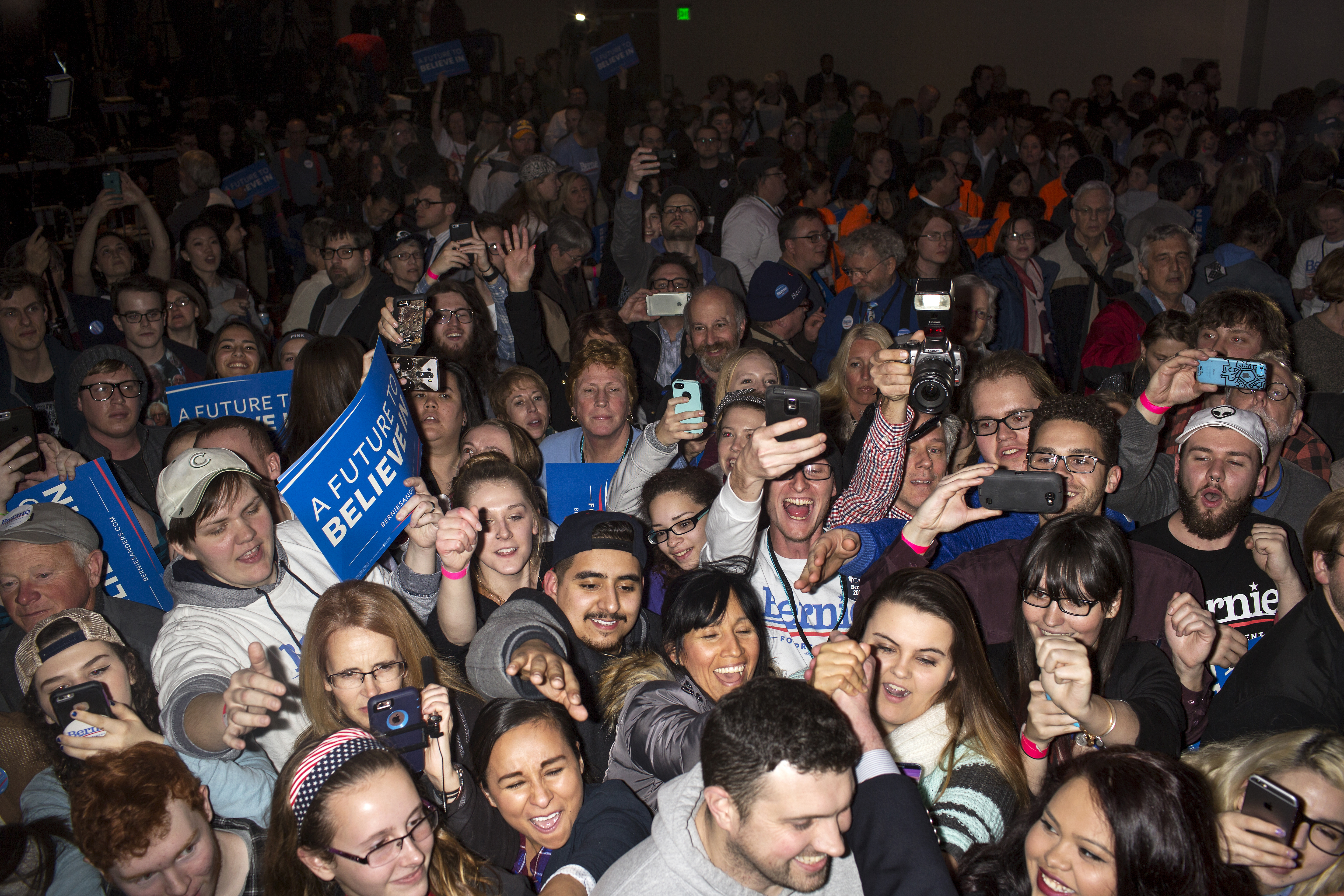 Supporters cheer for Vermont Sen. Bernie Sanders on caucus night during a rally in Des Moines, Iowa on Feb. 1, 2016.