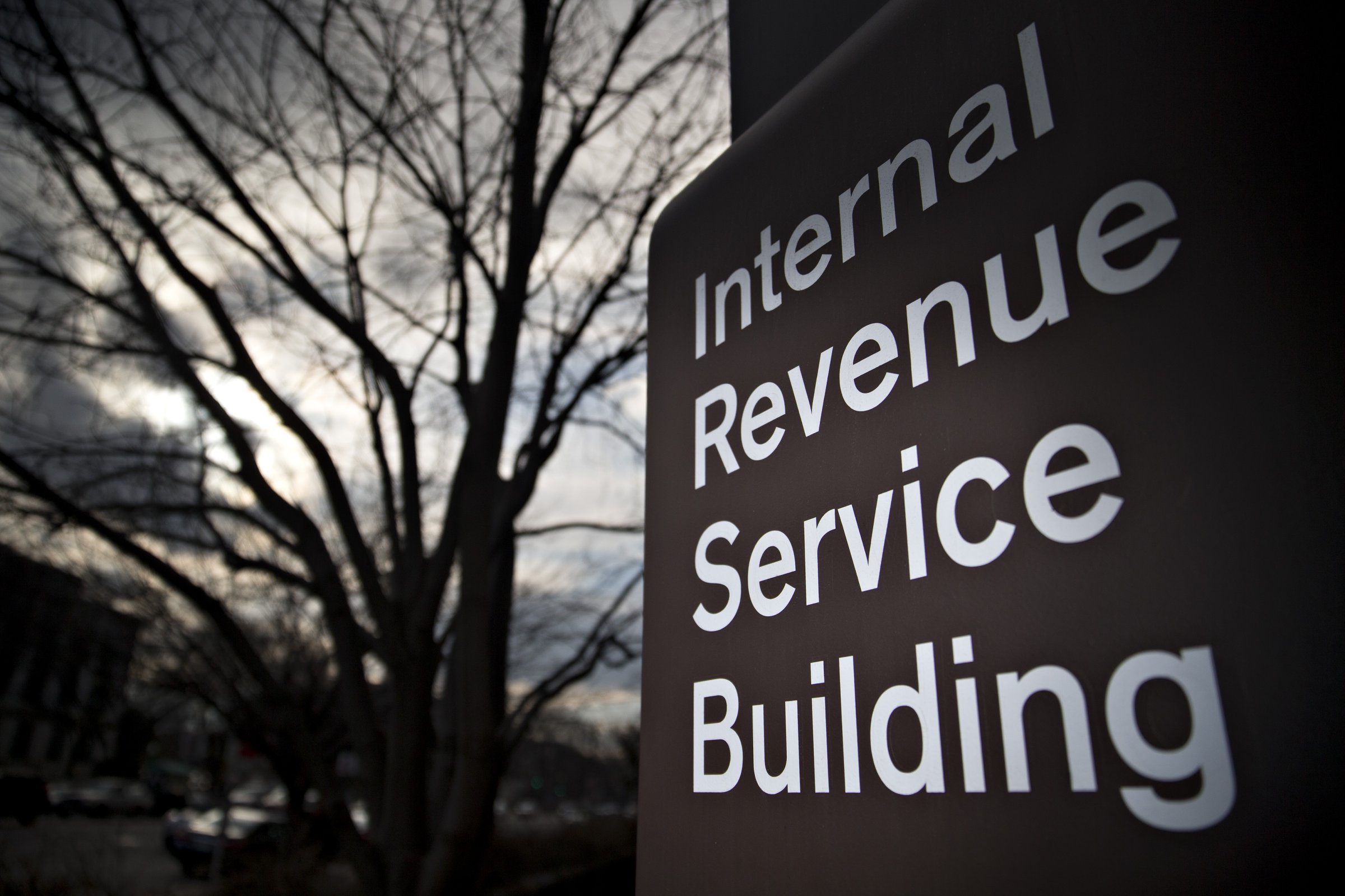 Signage for the Internal Revenue Service (IRS) stands outside the IRS headquarters building in Washington, D.C., U.S., on Wednesday, Feb. 17, 2016.