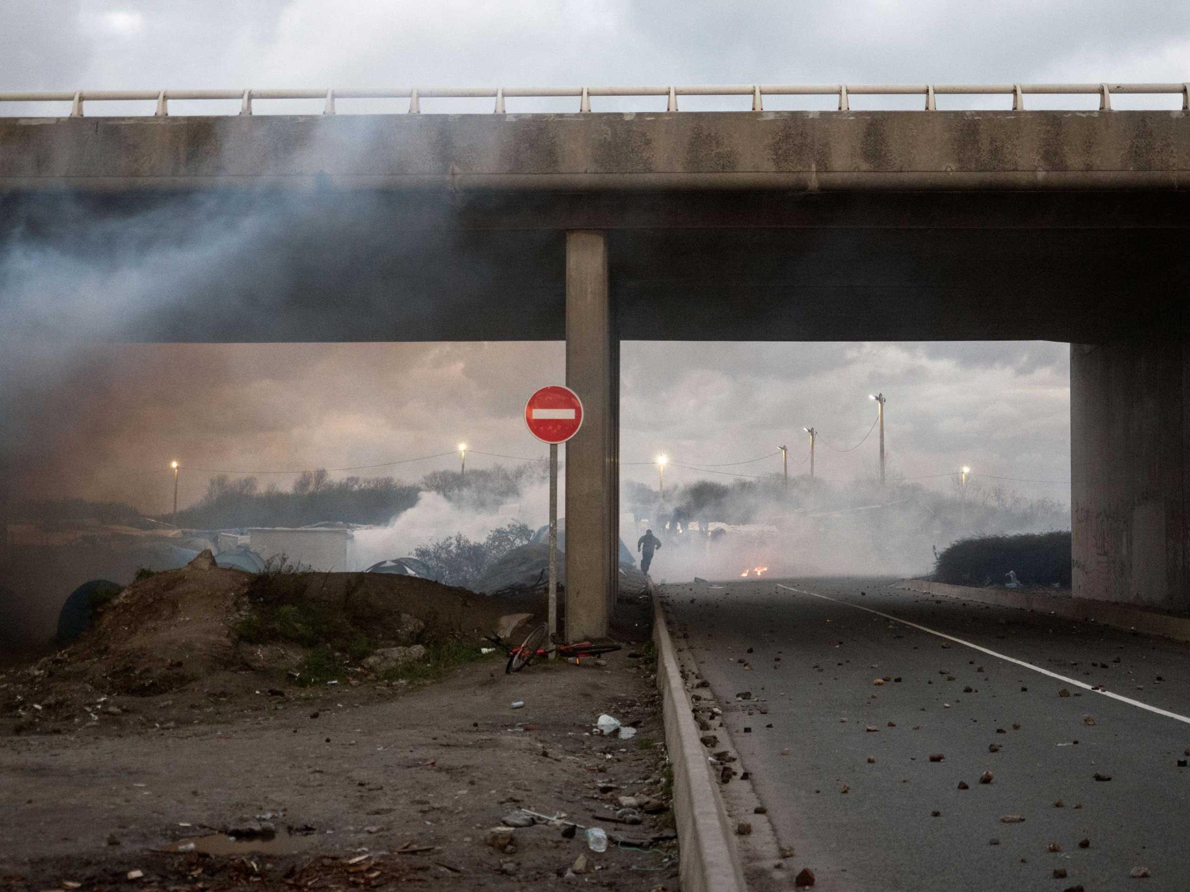 A clash between migrants and police in Calais, France, Nov. 25, 2015, where a mix of refugees, asylum seekers and economic migrants from Darfur, Afghanistan, Syria, Iraq, and Eritrea live in the shantytown known as the Òjungle."