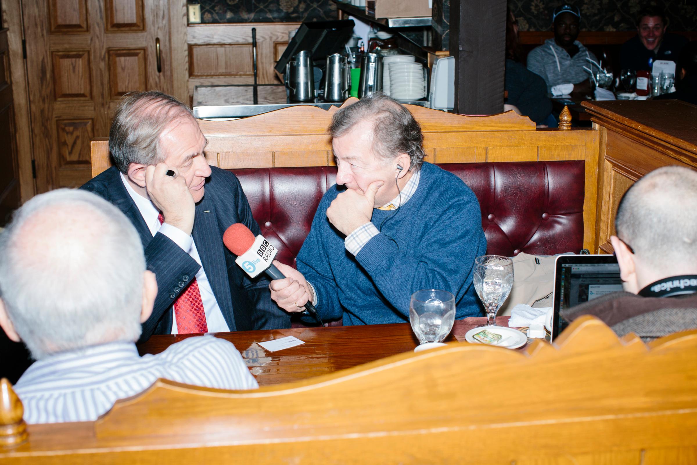 BBC 5 reporter Rhod Sharp interviews former Virginia governor and Republican presidential candidate Jim Gilmore before he gets lunch at the Puritan Backroom on the day of primary voting, Feb. 9, 2016. Sharp's radio program is called "Up All Night." The Puritan Backroom is a long-time favorite stop of political candidates in the state and place where journalists and political junkies hang out on election days hoping to meet candidates. Gilmore finished in last place among major Republican candidates still in the race with a total of 150 votes.