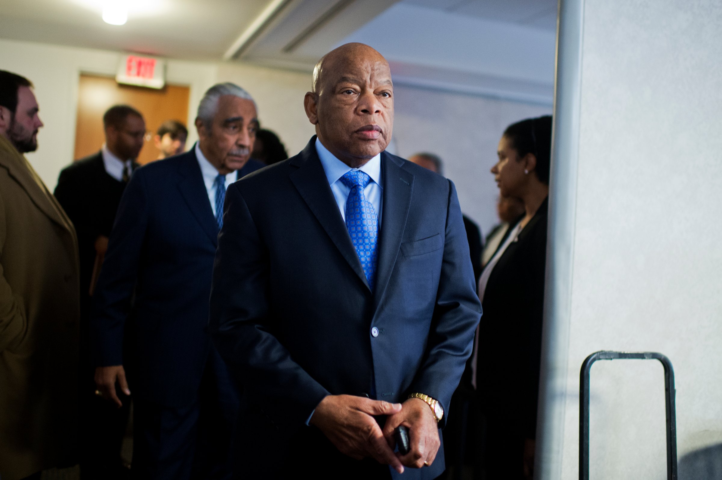 UNITED STATES - FEBRUARY 11: Rep. John Lewis, D-Ga., and Rep. Charlie Rangel, D-N.Y., behind him, arrive for a news conference at the DNC where members of the Congressional Black Caucus PAC endorsed Hillary Clinton for president, February 11, 2016. (Photo By Tom Williams/CQ Roll Call)