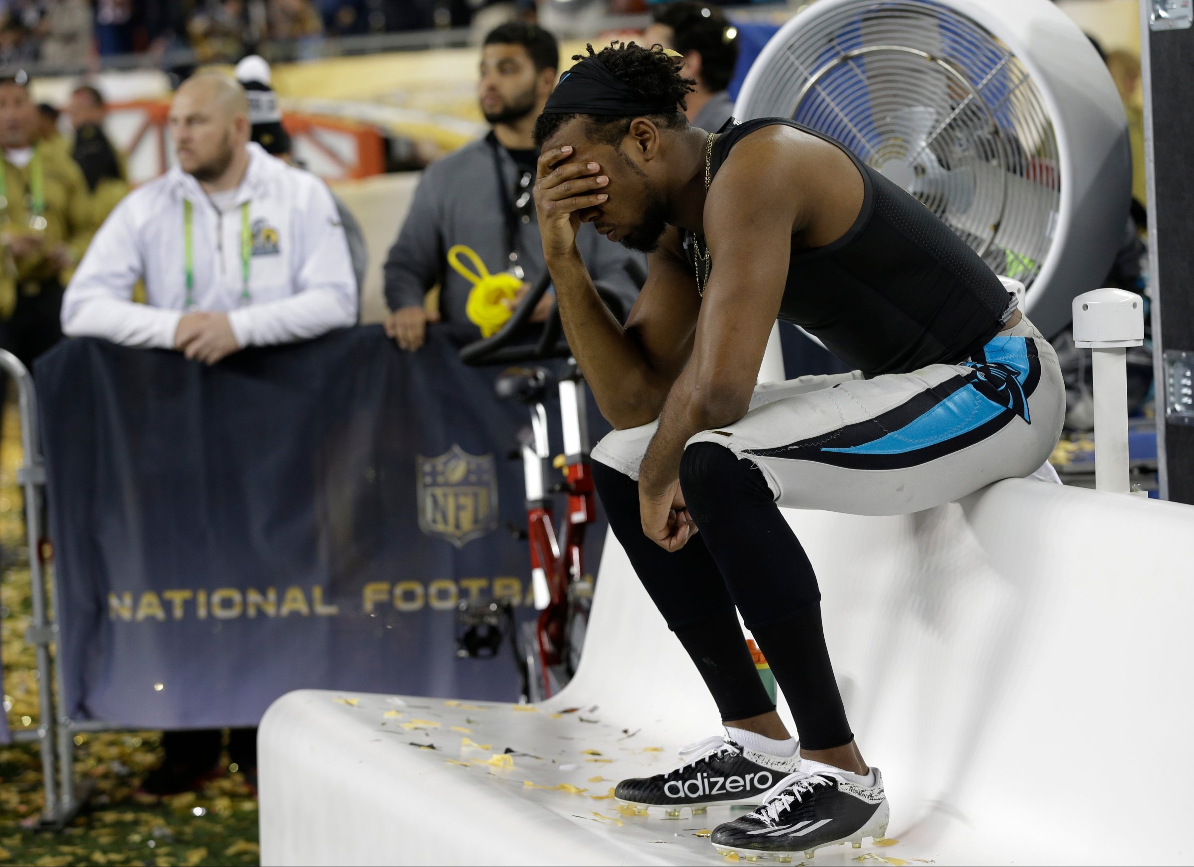 Carolina Panthers Josh Norman (24) sits on the bench after the NFL Super Bowl 50 football game against the Denver Broncos Sunday in Santa Clara, Calif., on Feb. 7, 2016.
