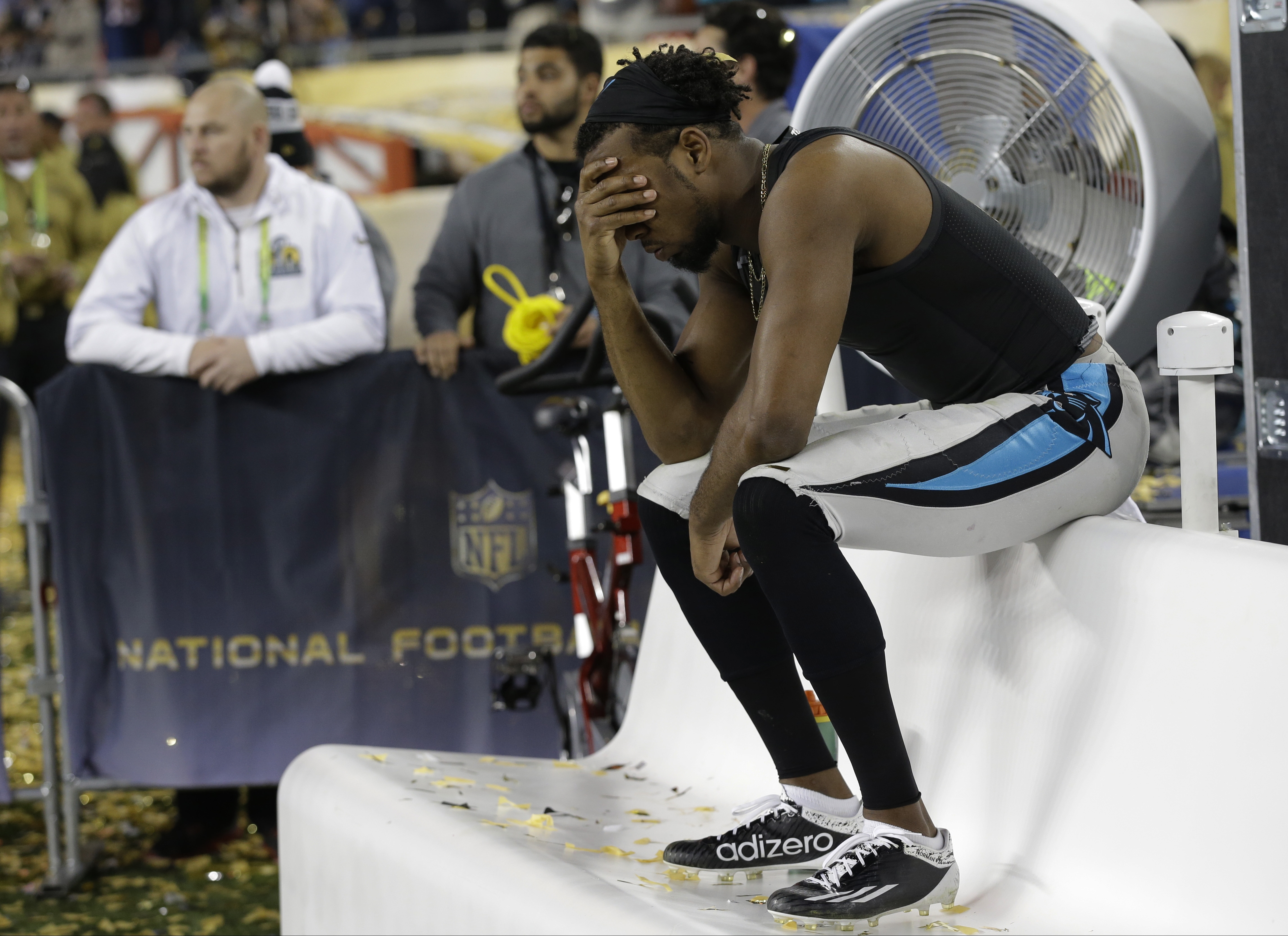 Carolina Panthers Josh Norman (24) sits on the bench after the NFL Super Bowl 50 football game against the Denver Broncos Sunday in Santa Clara, Calif., on Feb. 7, 2016. (Marcio Jose Sanche—AP)