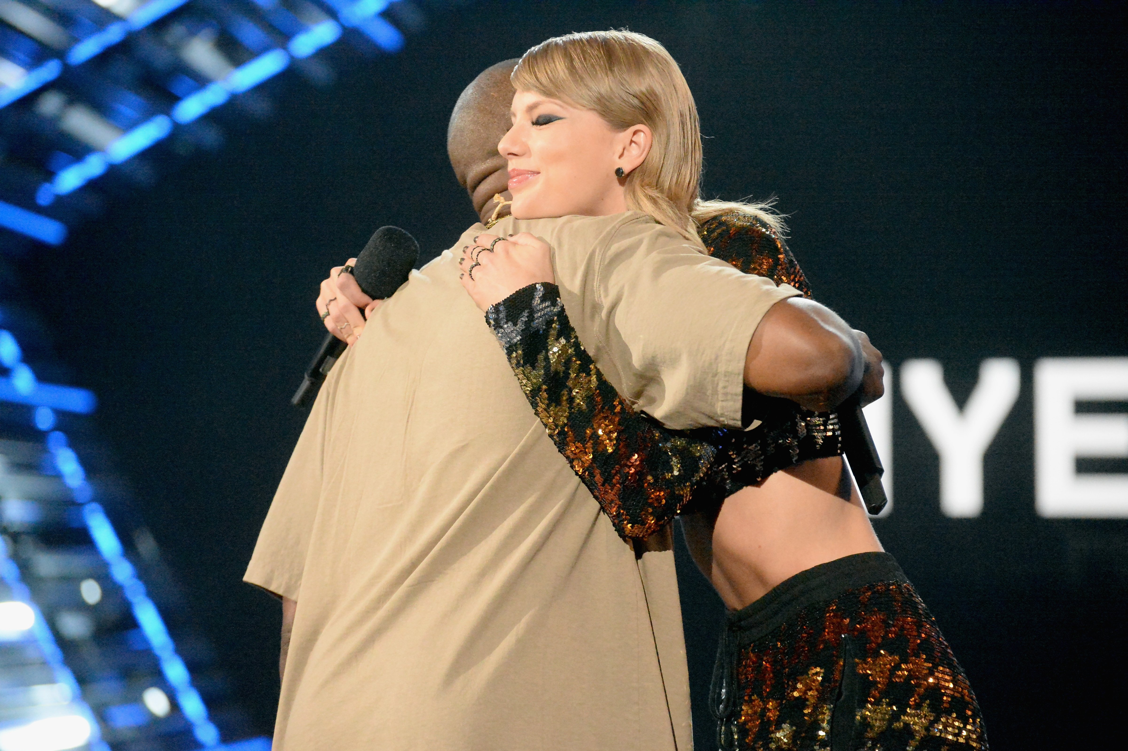 Kanye West accepts the Michael Jackson Video Vanguard Award from Taylor Swift during the 2015 MTV Video Music Awards on Aug. 30, 2015. (Jeff Kravitz—MTV/ Getty)