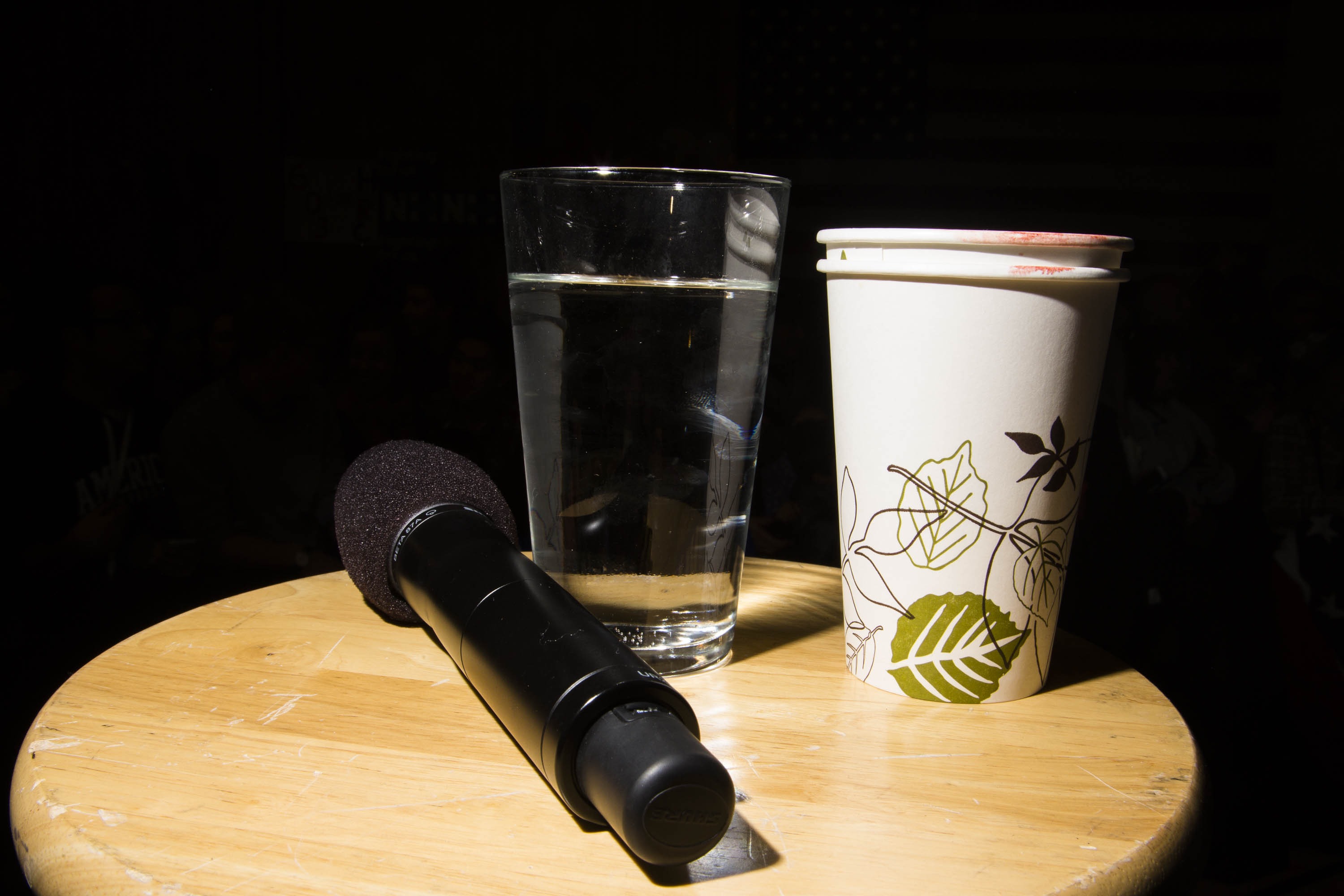 A microphone and cup used by Democratic presidential candidate, former Secretary of State Hillary Clinton sit on a stool during a campaign event at Rundlett Middle School on Feb. 6, 2016, in Concord, N.H.