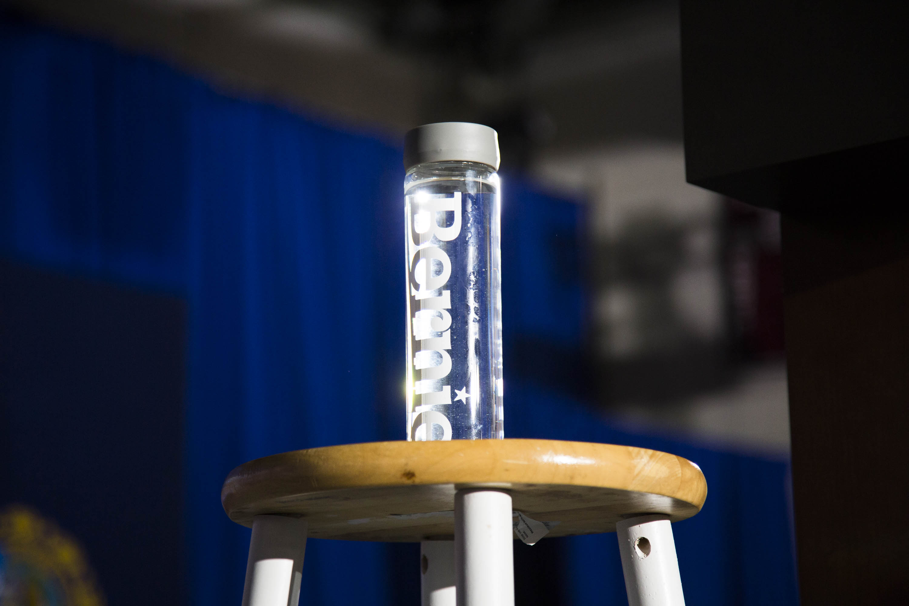 Water belonging to Democratic presidential candidate, Vermont Sen. Bernie Sanders on a stool at a New Hampshire primary night rally at Concord High School on Feb. 9, 2016, in Concord, N.H.