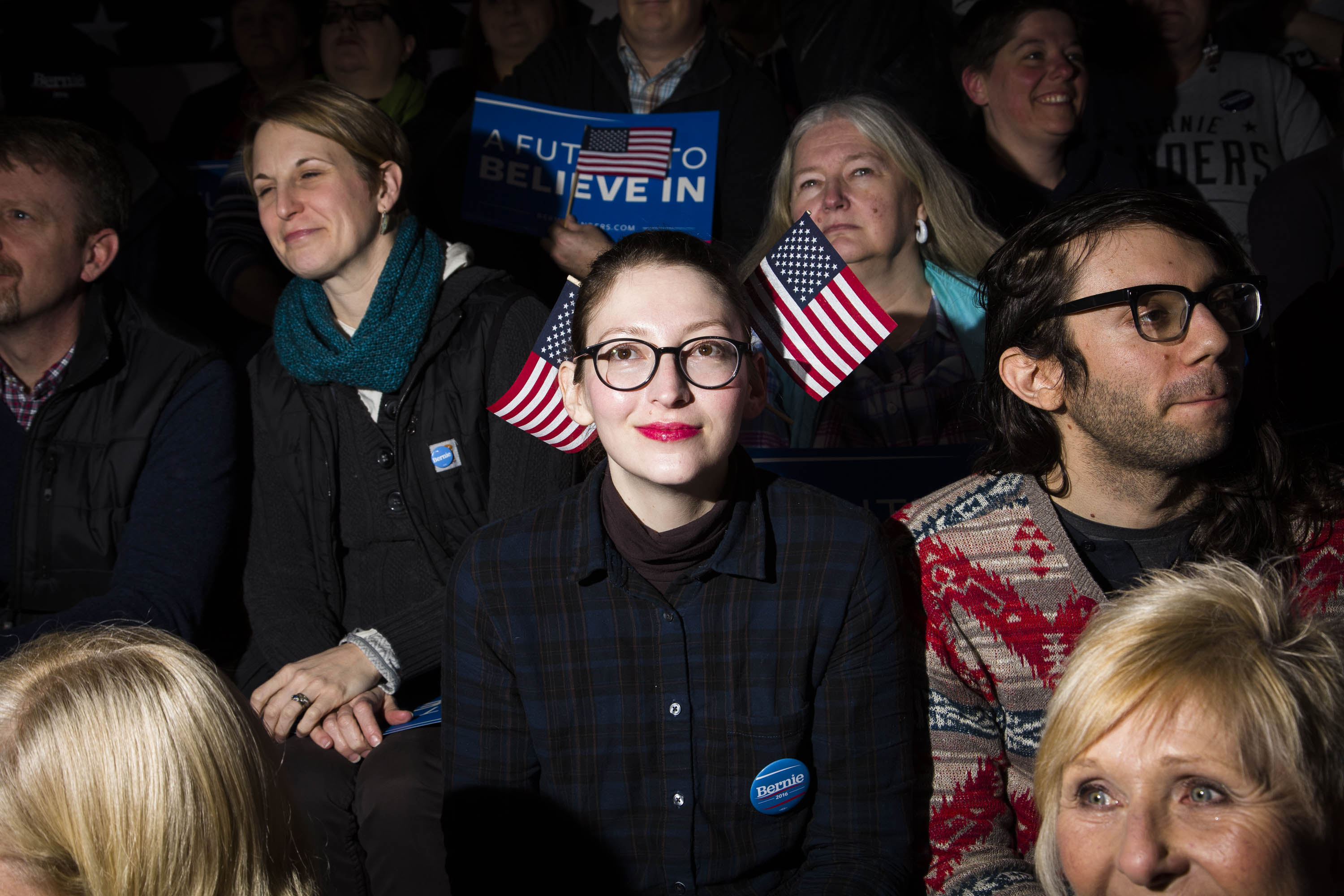 Anjuli Willmer sports double flags at a New Hampshire primary night rally for Democratic presidential candidate, Vermont Sen. Bernie Sanders at Concord High School on Tuesday, Feb.  9, 2016, in Concord, N.H. (Landon Nordeman for TIME)