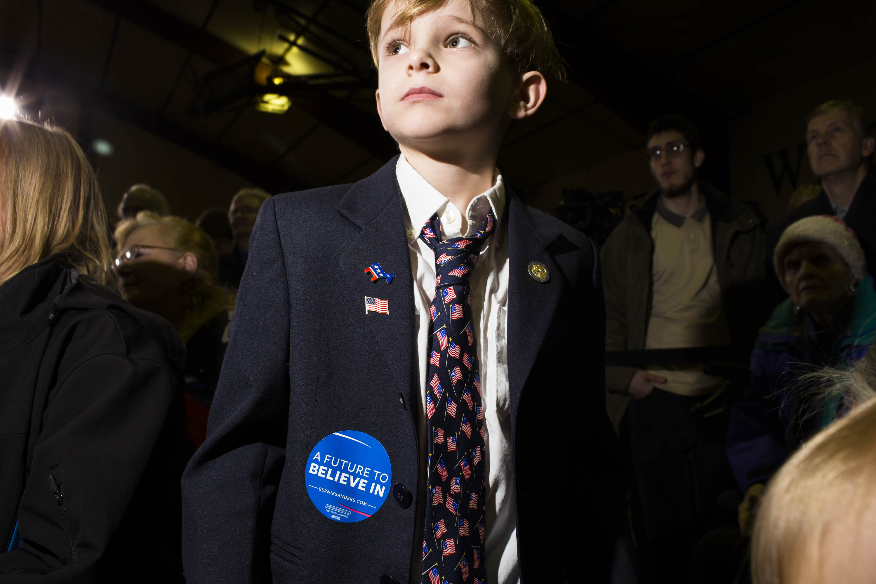 A young supporter of Democratic presidential candidate, Vermont Sen. Bernie Sanders attends a campaign event at Daniel Webster Community College on Feb/ 8, 2016, in Nashua, N.H.