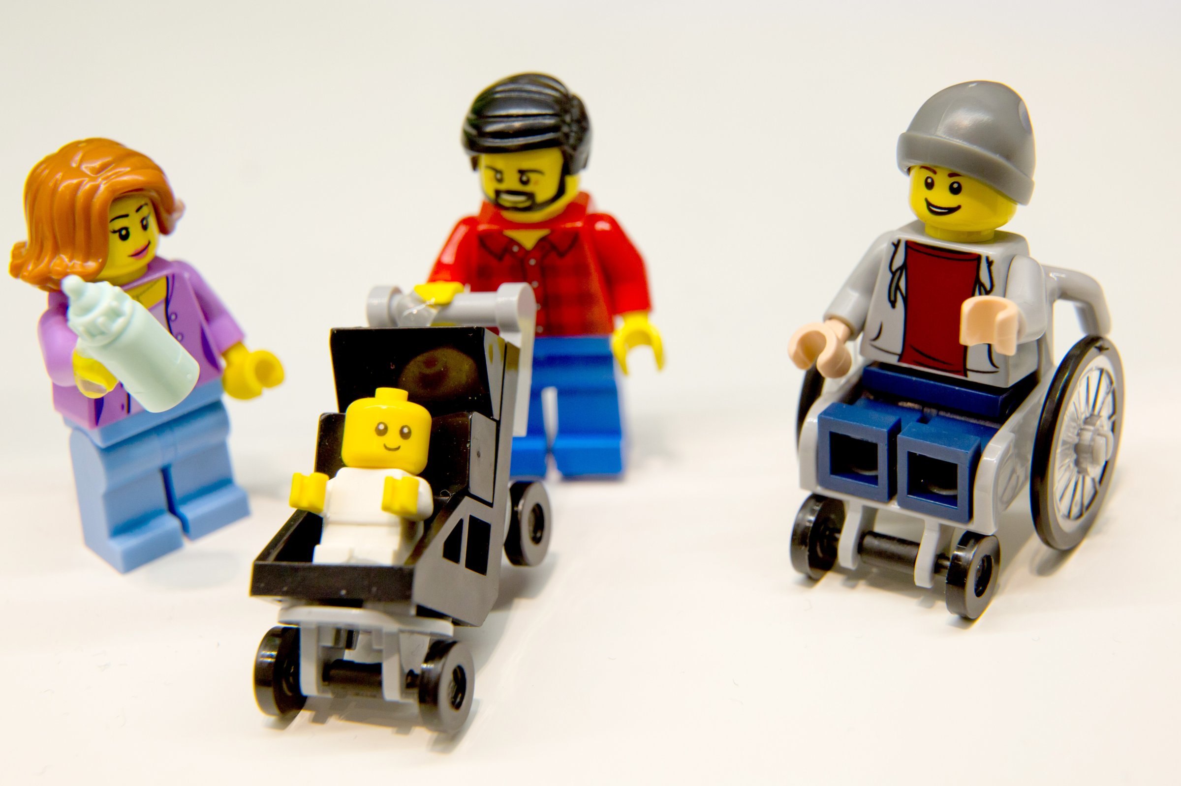 Lego figurines, including one in a wheelchair are pictured at the Lego booth on January 28, 2016 in Nuernberg during the 67th International Toy Fair.