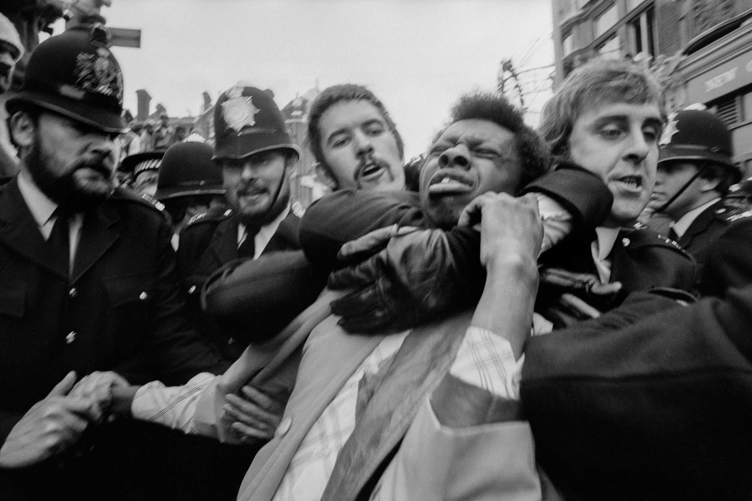 Police making an arrest. during the race riots in Lewisham, London.1977.