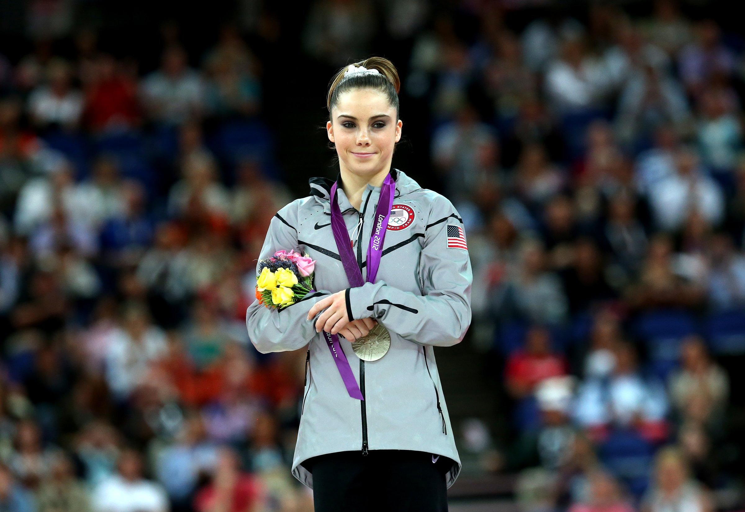 McKayla Maroney stands on the podium with her silver medal during the medal ceremony following the Artistic Gymnastics Women's Vault final of the London 2012 Olympic Games at North Greenwich Arena on August 5, 2012 in London, England.