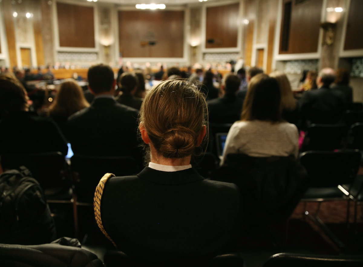 U.S. Navy LCDR Stephanie Hayes listens to testimony about women in the military during a Senate Armed Services Committee hearing on Capitol Hill, Feb. 2, 2016 in Washington, DC. (Mark Wilson—Getty Images)
