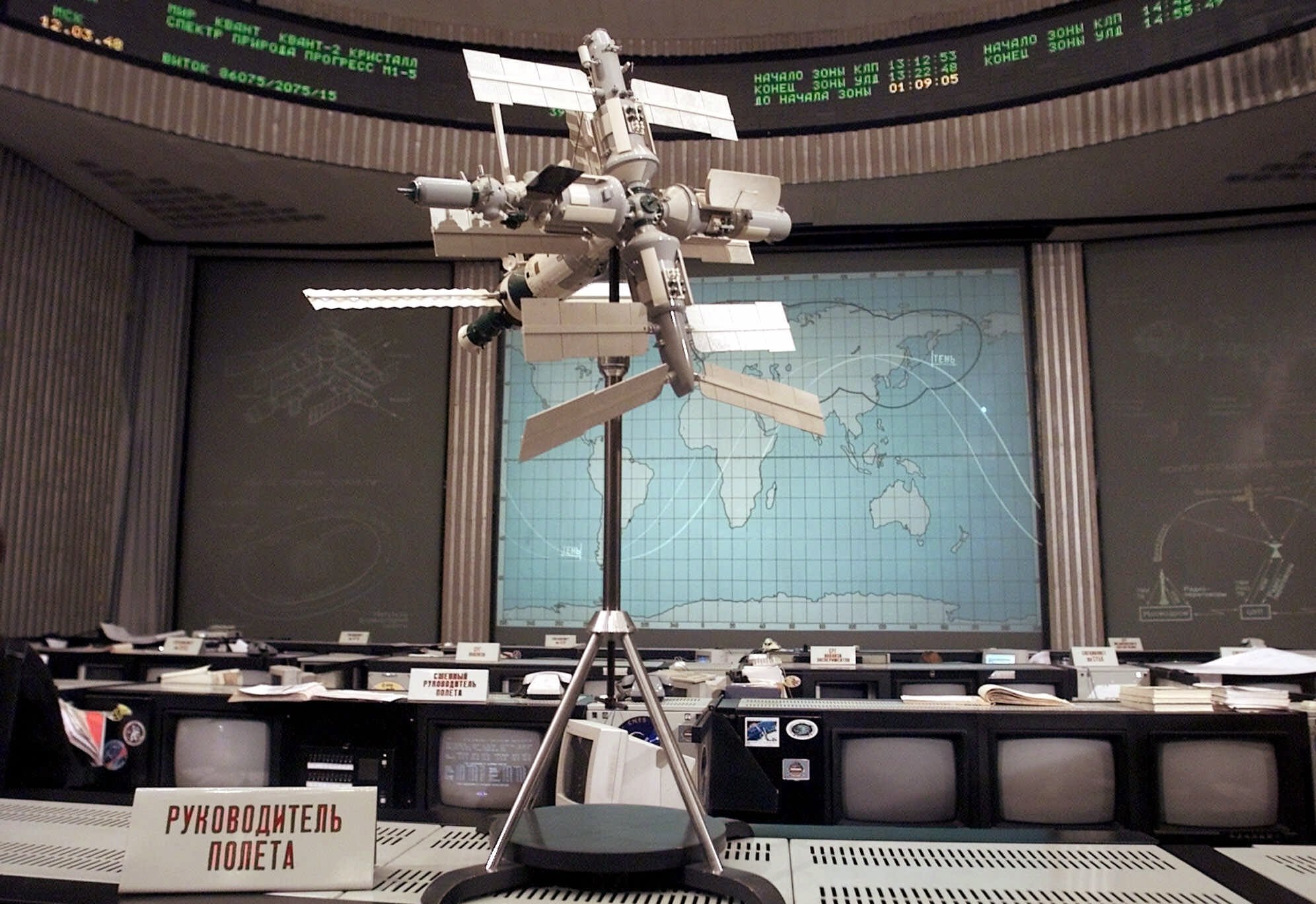 A scale model of the Mir space station stands in its Mission Control center, at Korolyov, outside Moscow on March 7, 2001. Russian space officials set March 20 as the date for dumping the Mir space station, saying they want to wait until the craft drifts closer to Earth before giving it the final shove toward a fiery plunge into the Pacific Ocean.