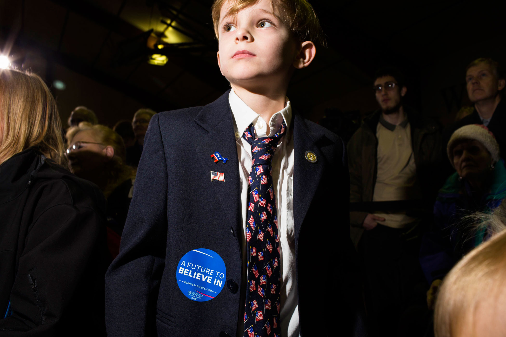 A young supporter of Democratic presidential candidate, Vermont Sen. Bernie Sanders attends a campaign event at Daniel Webster Community College on Feb. 8, 2016, in Nashua, N.H.