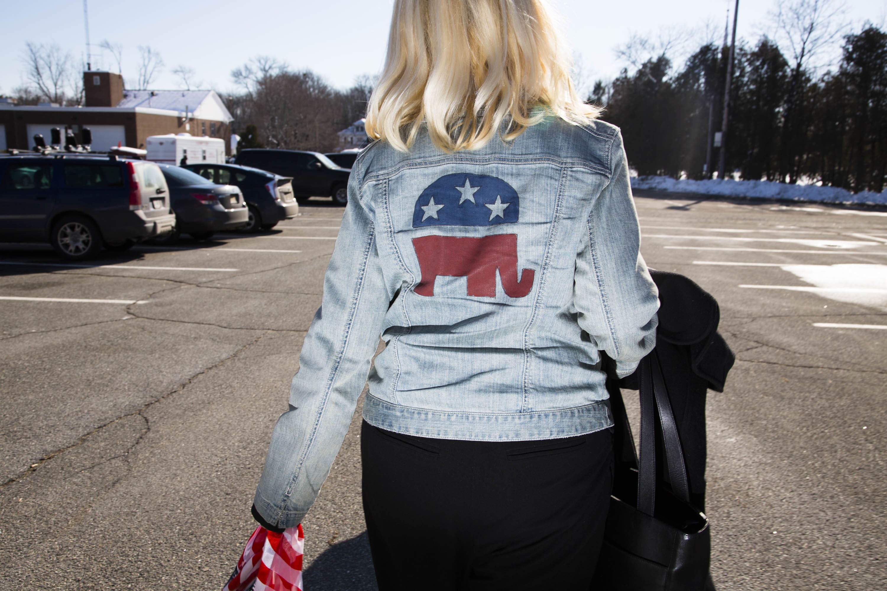 A woman wears a jacket depicting the Republican Party's elephant on Feb. 7, 2016, in Hampton, N.H. (Landon Nordeman for TIME)