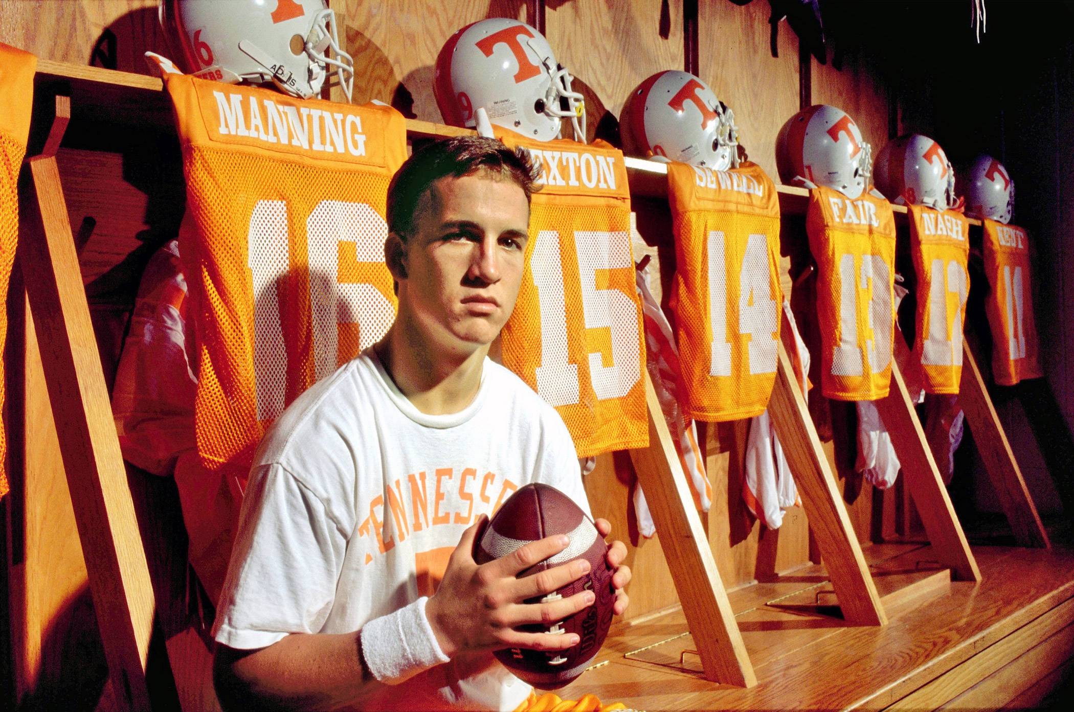 Peyton Manning played quarterback in college football with the Tennessee Volunteers, seen here in the locker room circa 1995 in Knoxville, Tenn.
