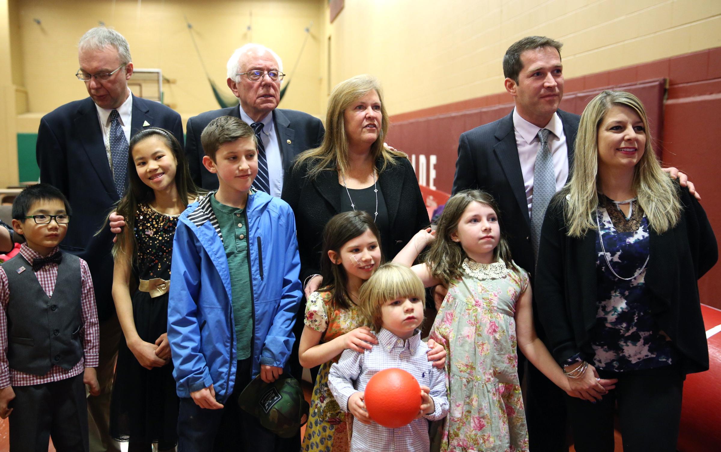 Vermont Sen. Bernie Sanders watches primary returns with his family on election night in Concord, N.H.,on Feb. 9, 2016.