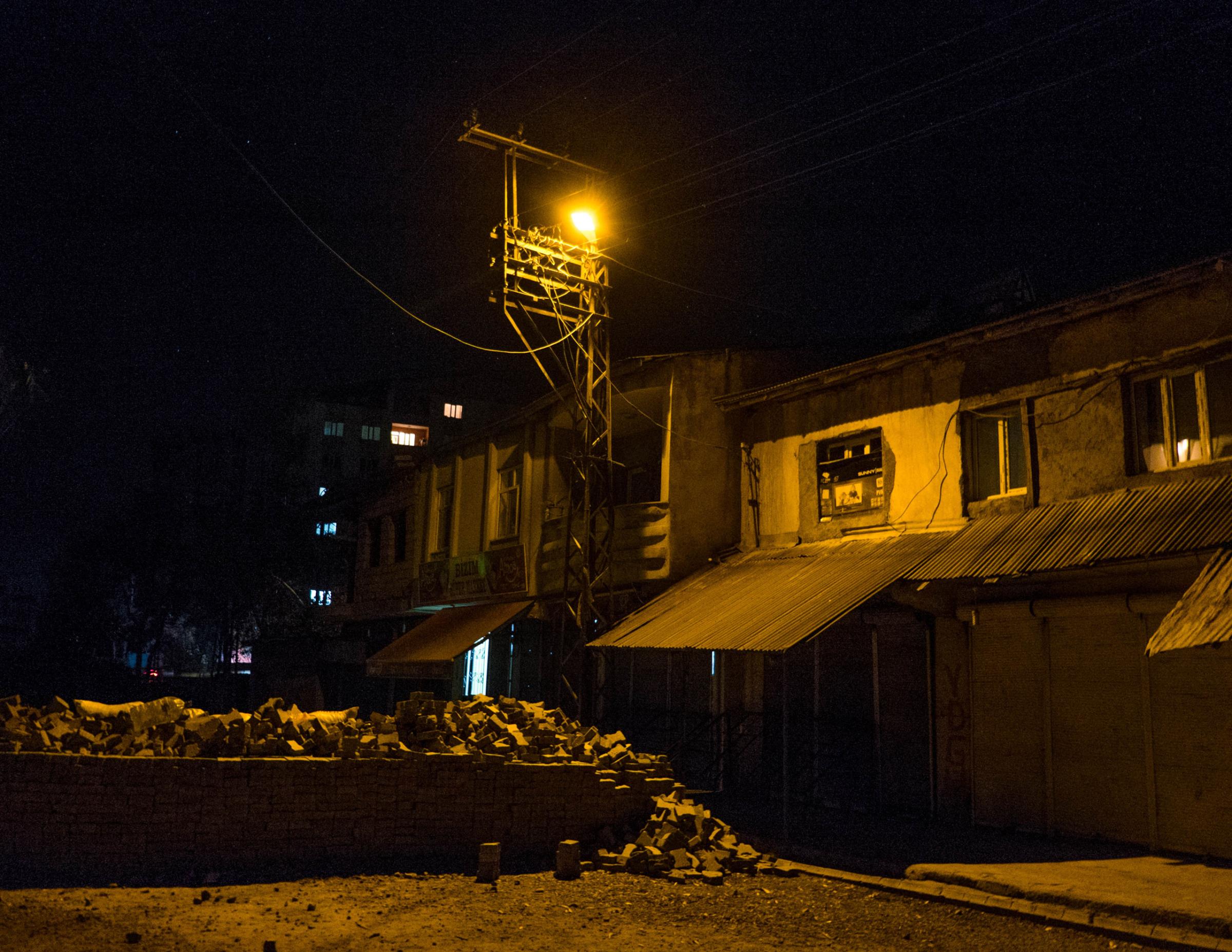 YUKSEKOVA, TURKEY - NOVEMBER 03, 2015: Barricades in Cumhuriyet, a self declared autonomous neighborhood in Yuksekova. Since July several neighborhoods in the city have declared autonomy and built self-rules, with groups of young Kurds who have taken up arms and raise barricades to prevent the advances of the Turkish forces.